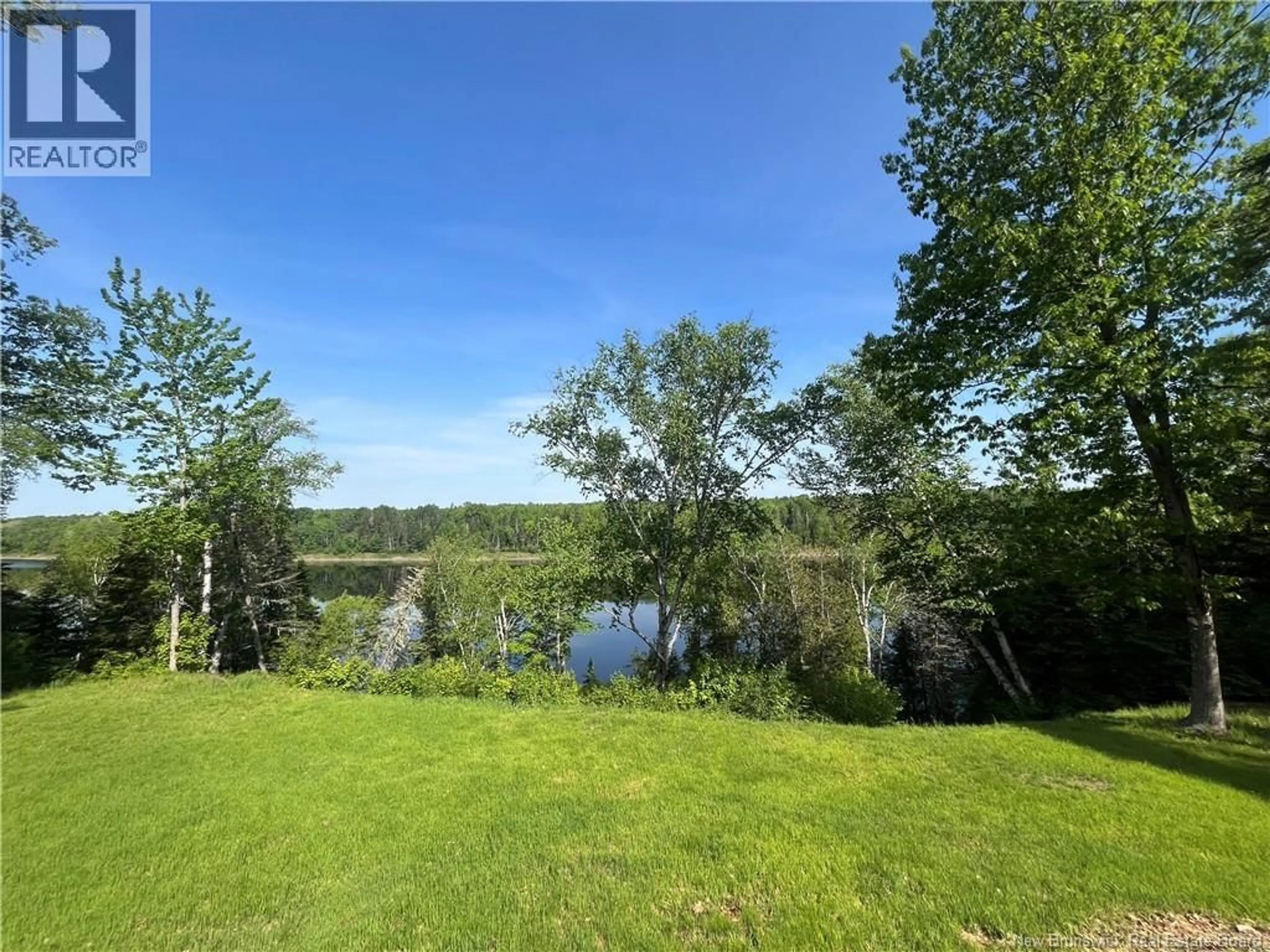 A pic from outside/outdoor area/front of a property/back of a property/a pic from drone, water/lake/river/ocean view for 2415 ROUTE 118, McKinleyville New Brunswick E9E2H4