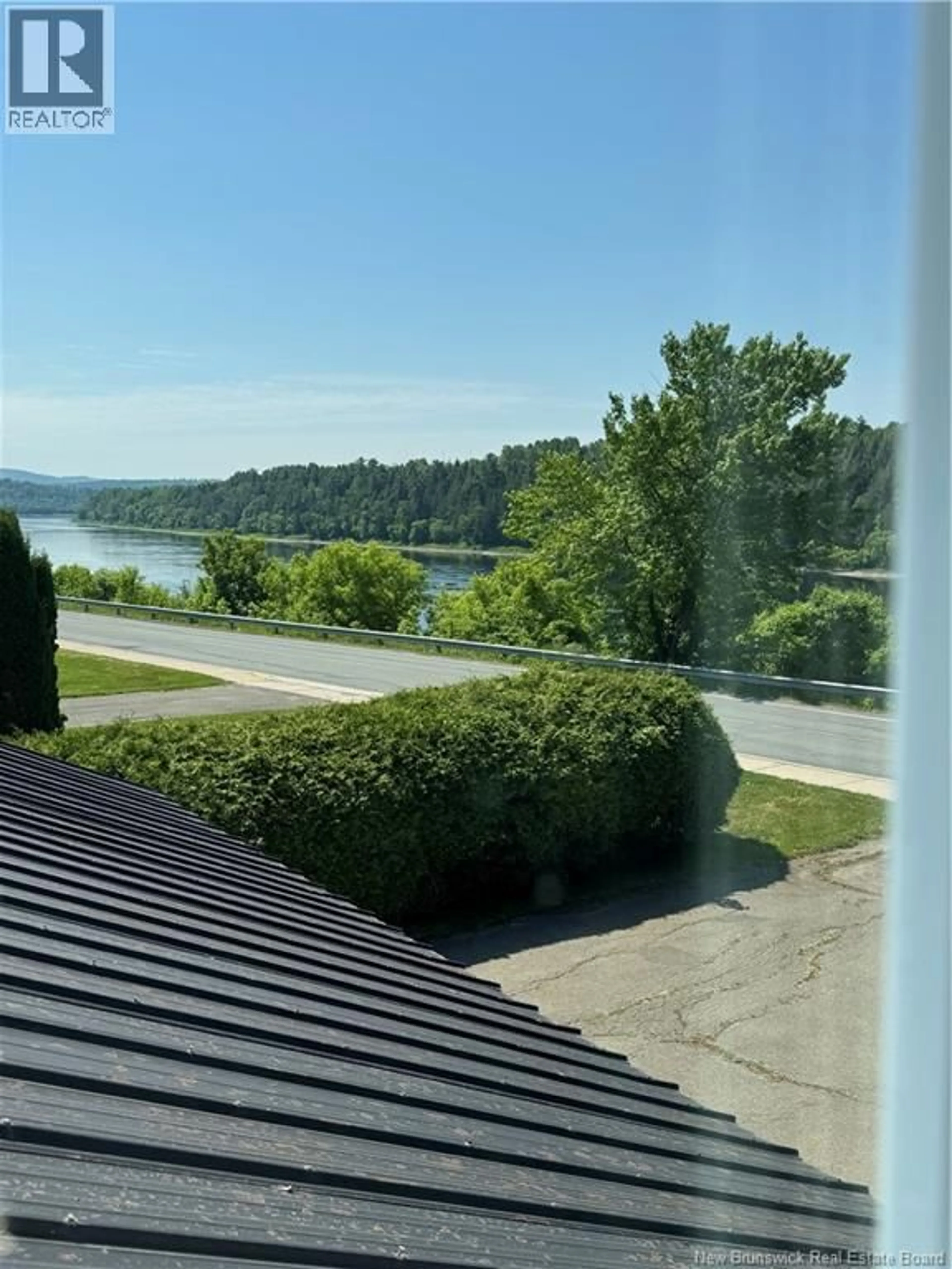 A pic from outside/outdoor area/front of a property/back of a property/a pic from drone, water/lake/river/ocean view for 250 MAIN ST, Bath New Brunswick E7J1E9