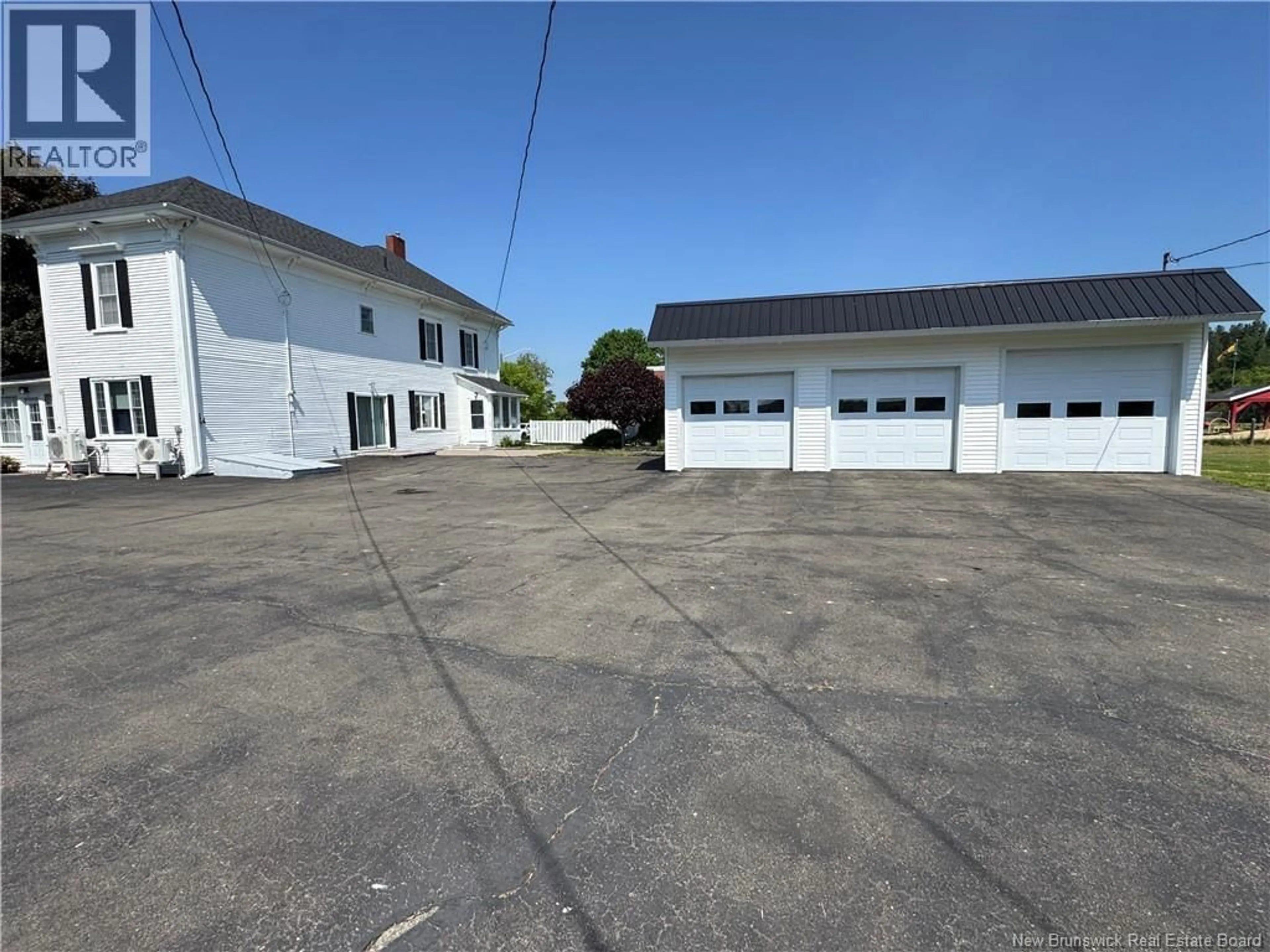 A pic from outside/outdoor area/front of a property/back of a property/a pic from drone, street for 252 MAIN ST, Bath New Brunswick E7J1E9