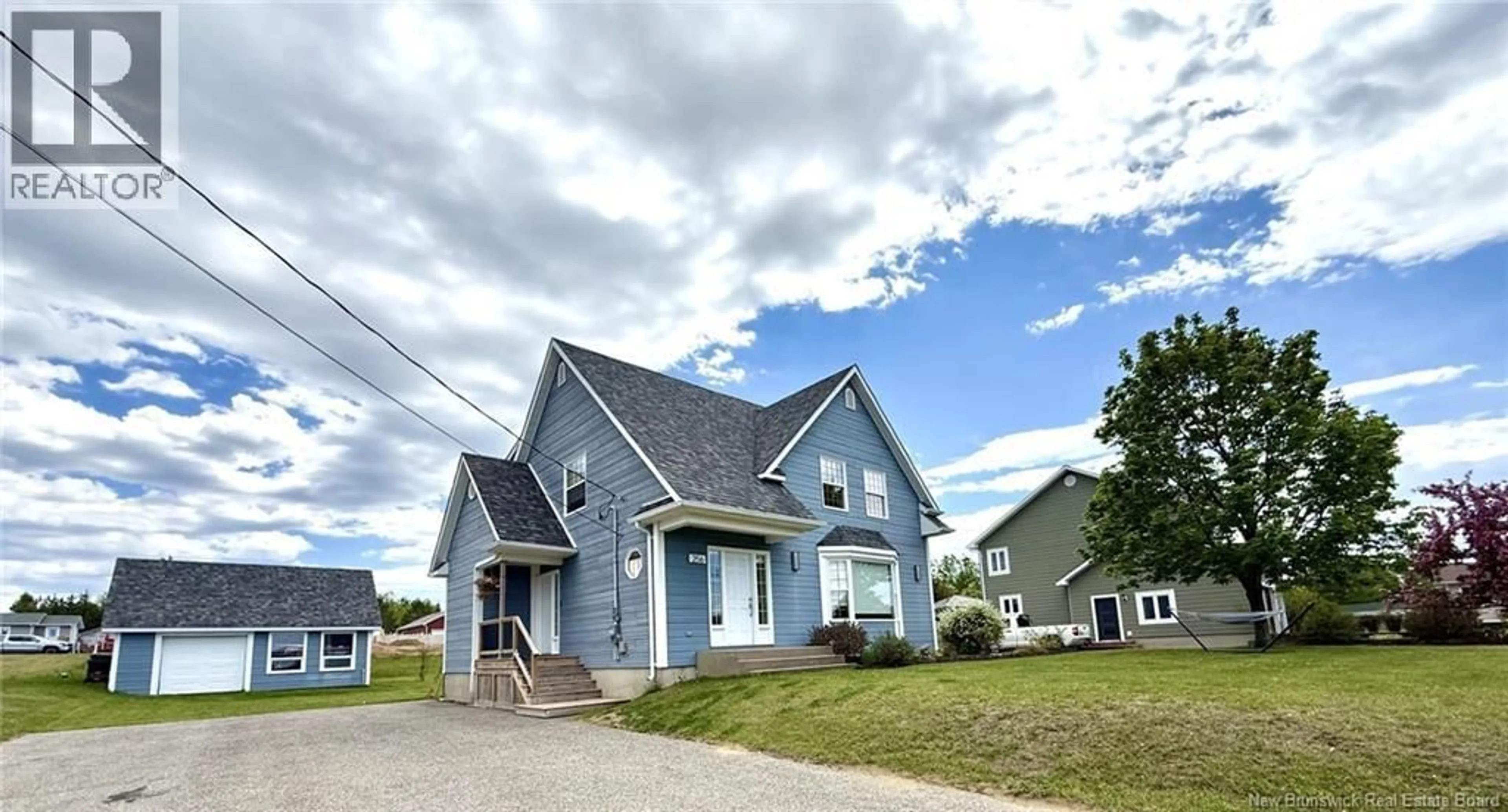 A pic from outside/outdoor area/front of a property/back of a property/a pic from drone, street for 256 RUE FOULEM, Caraquet New Brunswick E1W1A4