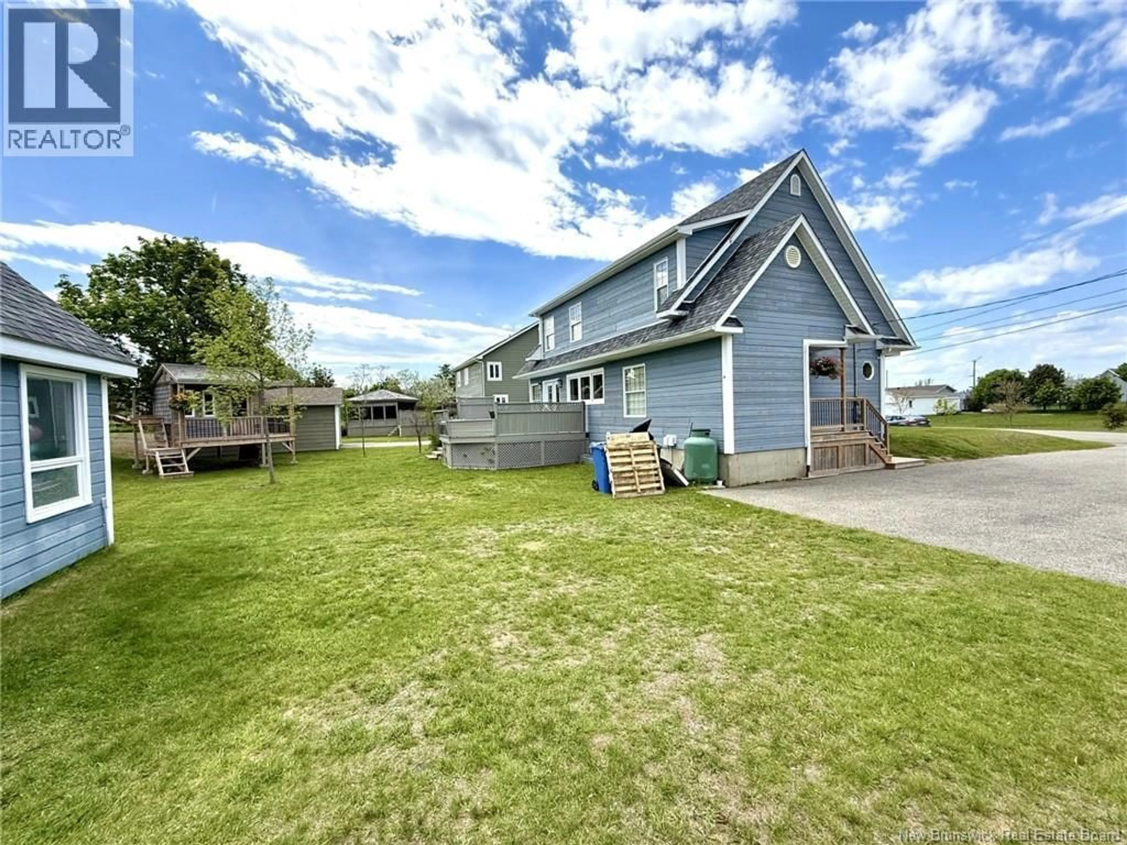 A pic from outside/outdoor area/front of a property/back of a property/a pic from drone, unknown for 256 RUE FOULEM, Caraquet New Brunswick E1W1A4