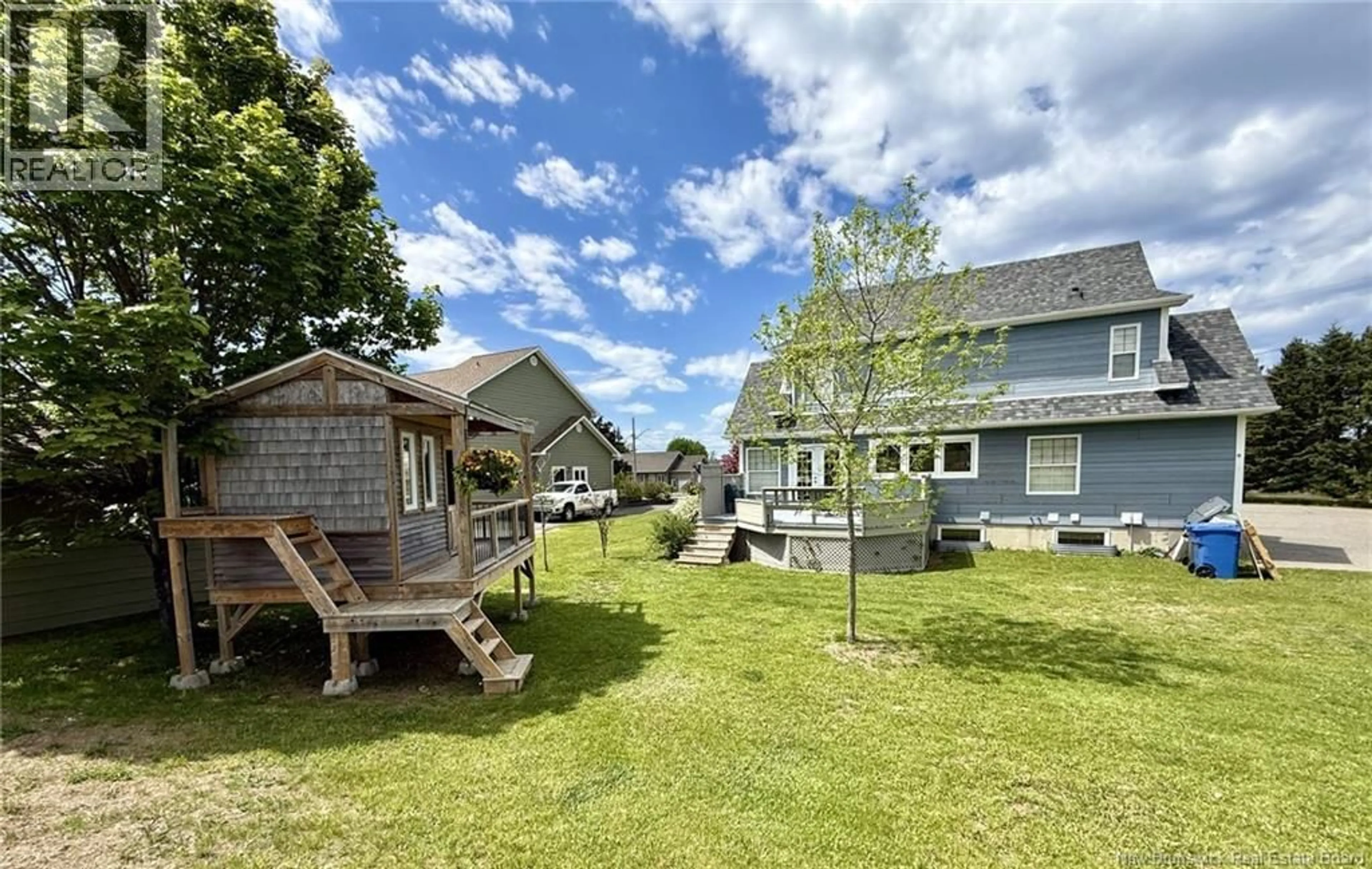 A pic from outside/outdoor area/front of a property/back of a property/a pic from drone, water/lake/river/ocean view for 256 RUE FOULEM, Caraquet New Brunswick E1W1A4