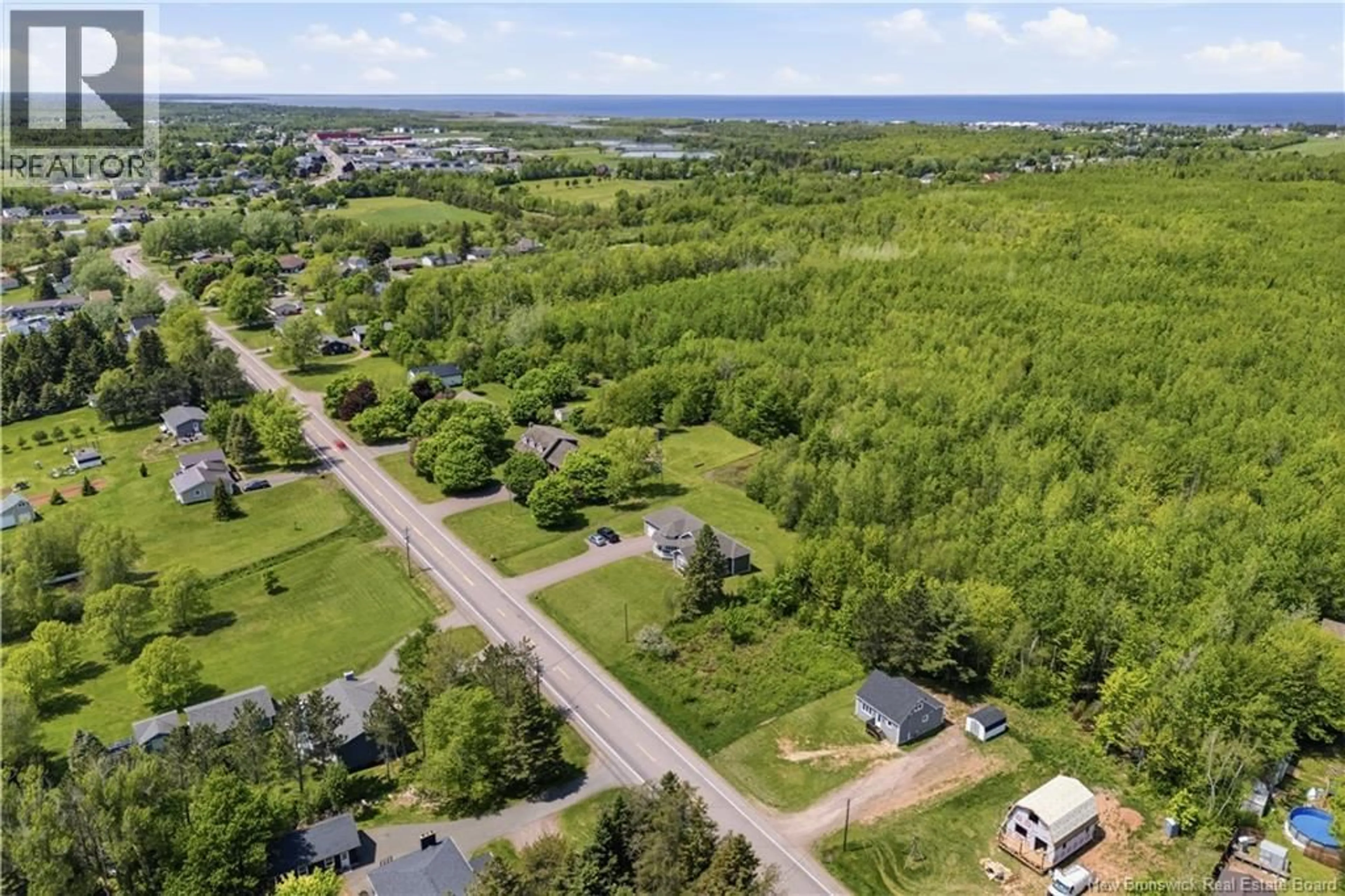 A pic from outside/outdoor area/front of a property/back of a property/a pic from drone, unknown for 128 CHEMIN TROIS-RUISSEAUX, Cap-Pelé New Brunswick E4N2B8