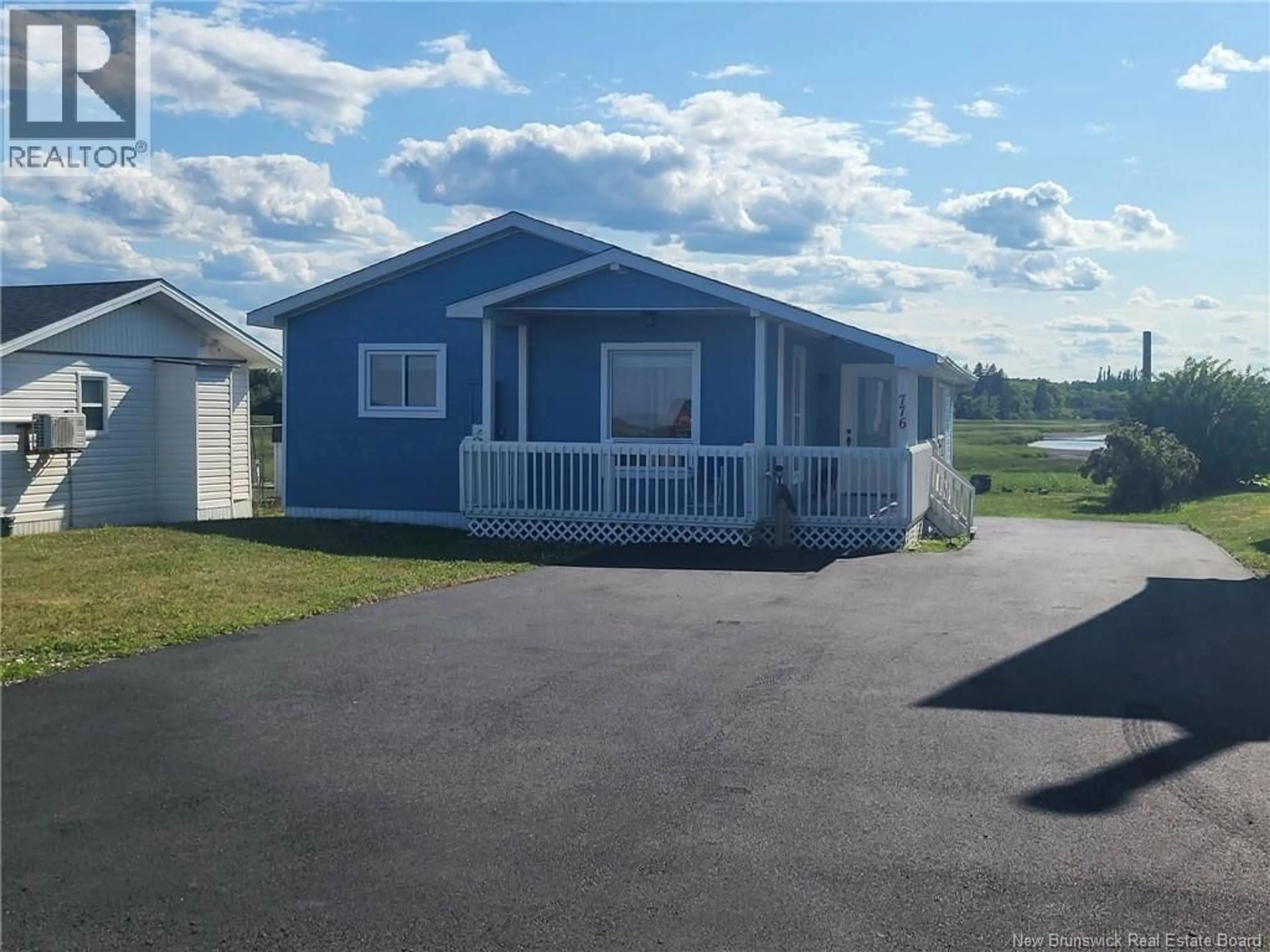 Home with vinyl exterior material, street for 776 JOHN CORMIER, Beresford New Brunswick E8K1W1