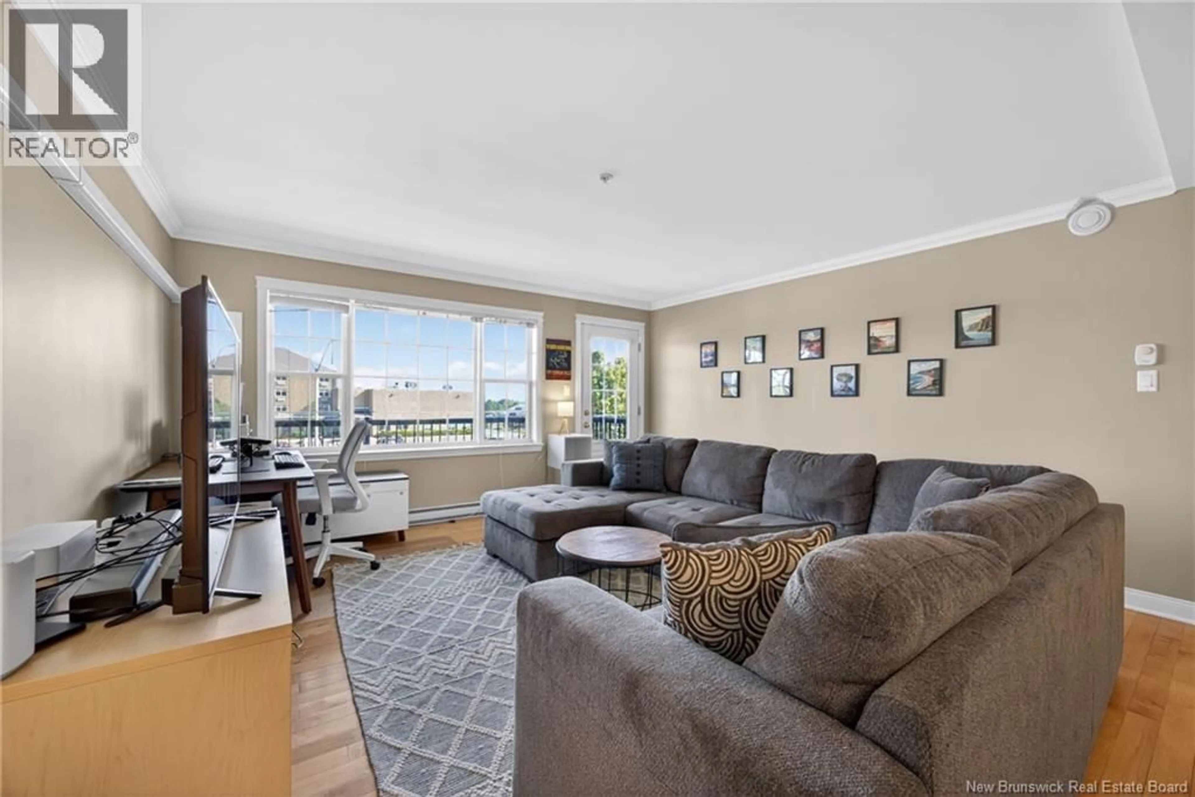 Living room with furniture, unknown for 204 - 65 BRAYSON BOULEVARD, Oromocto New Brunswick E2V0J2