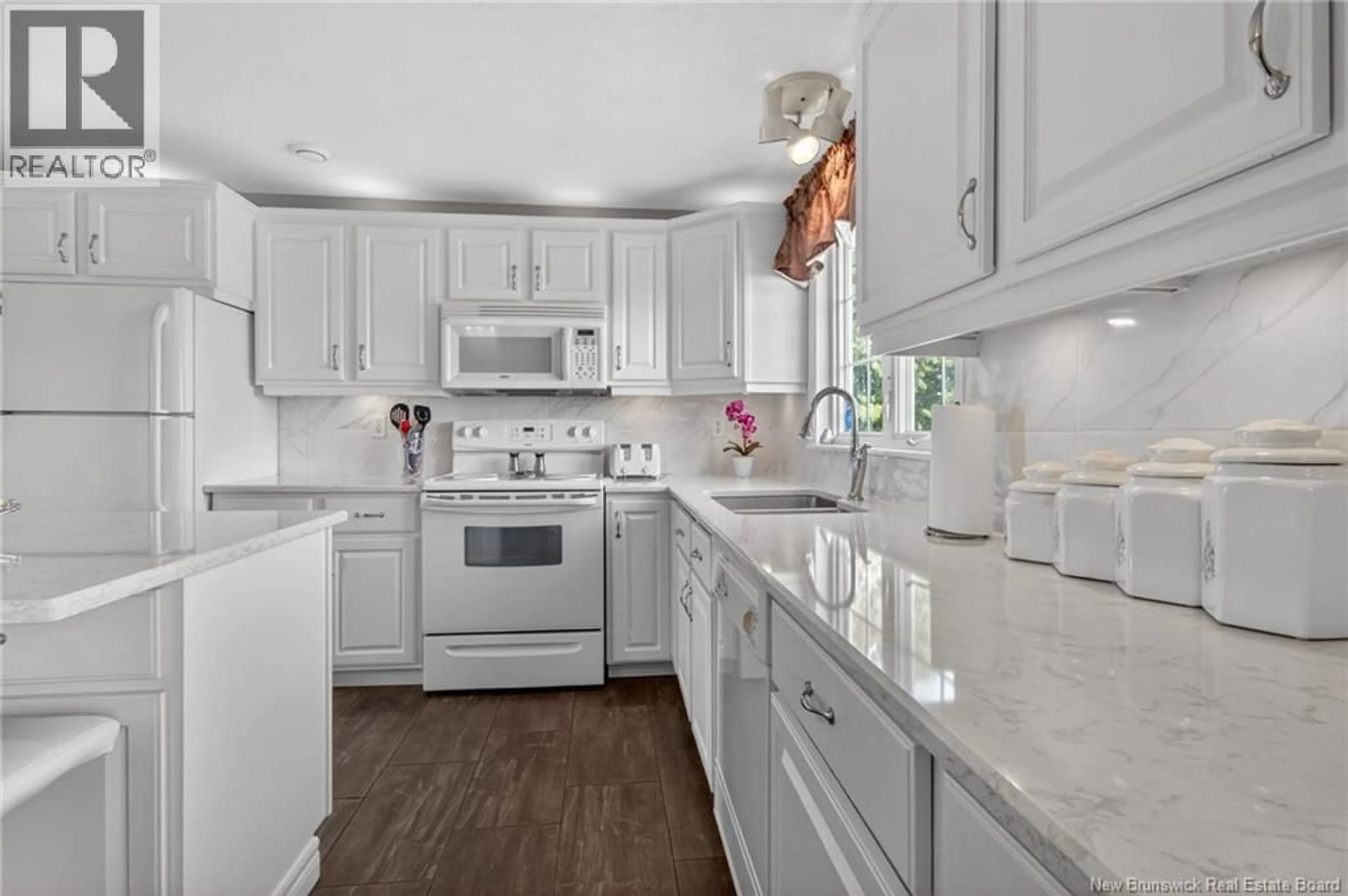 Open concept kitchen, ceramic/tile floor for 20 CORMIER CROSS ROAD, Cocagne New Brunswick E4R2J2