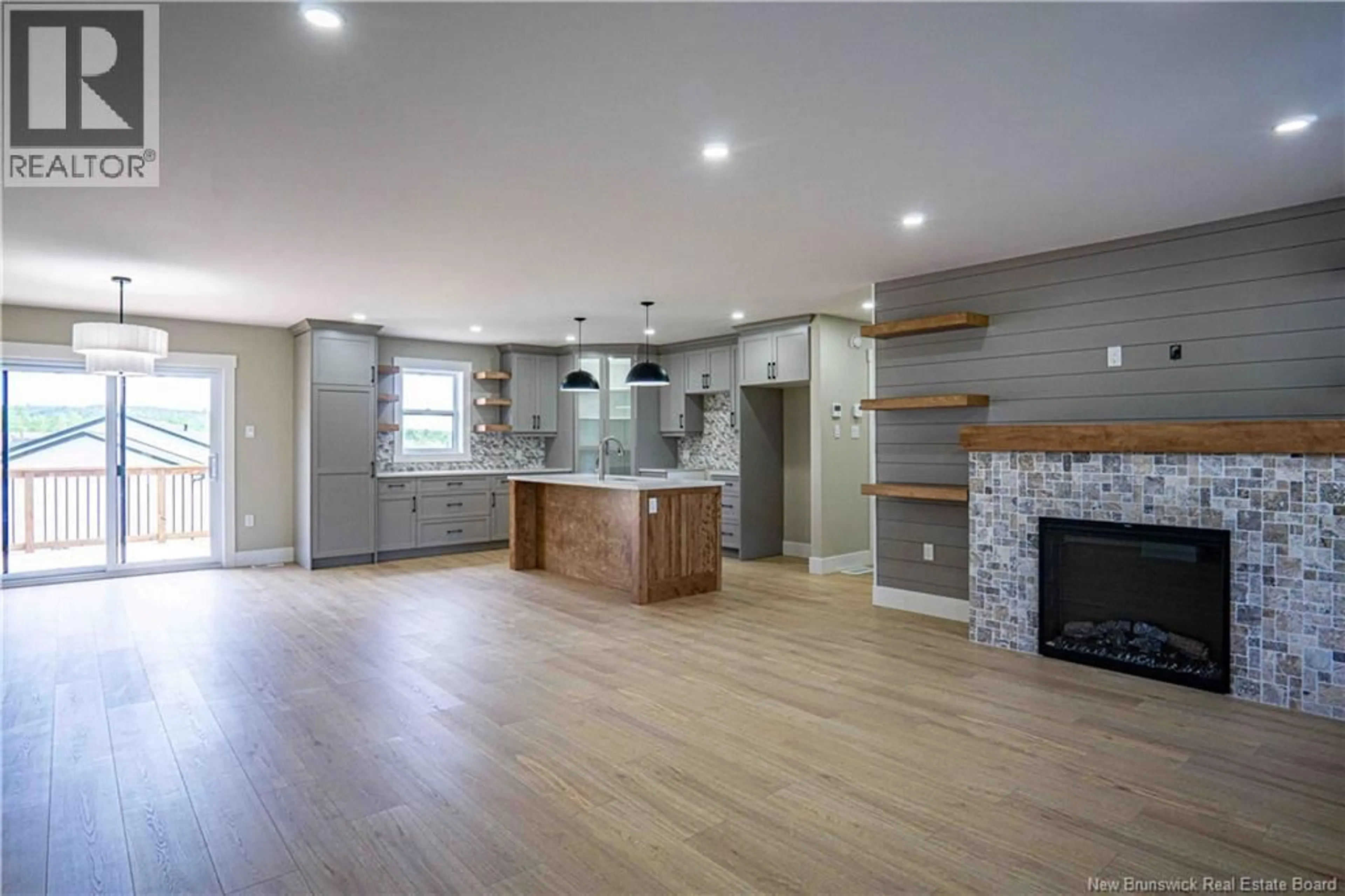Open concept kitchen, wood/laminate floor for 7 GEYSSEN COURT, Fredericton New Brunswick E3G0K8