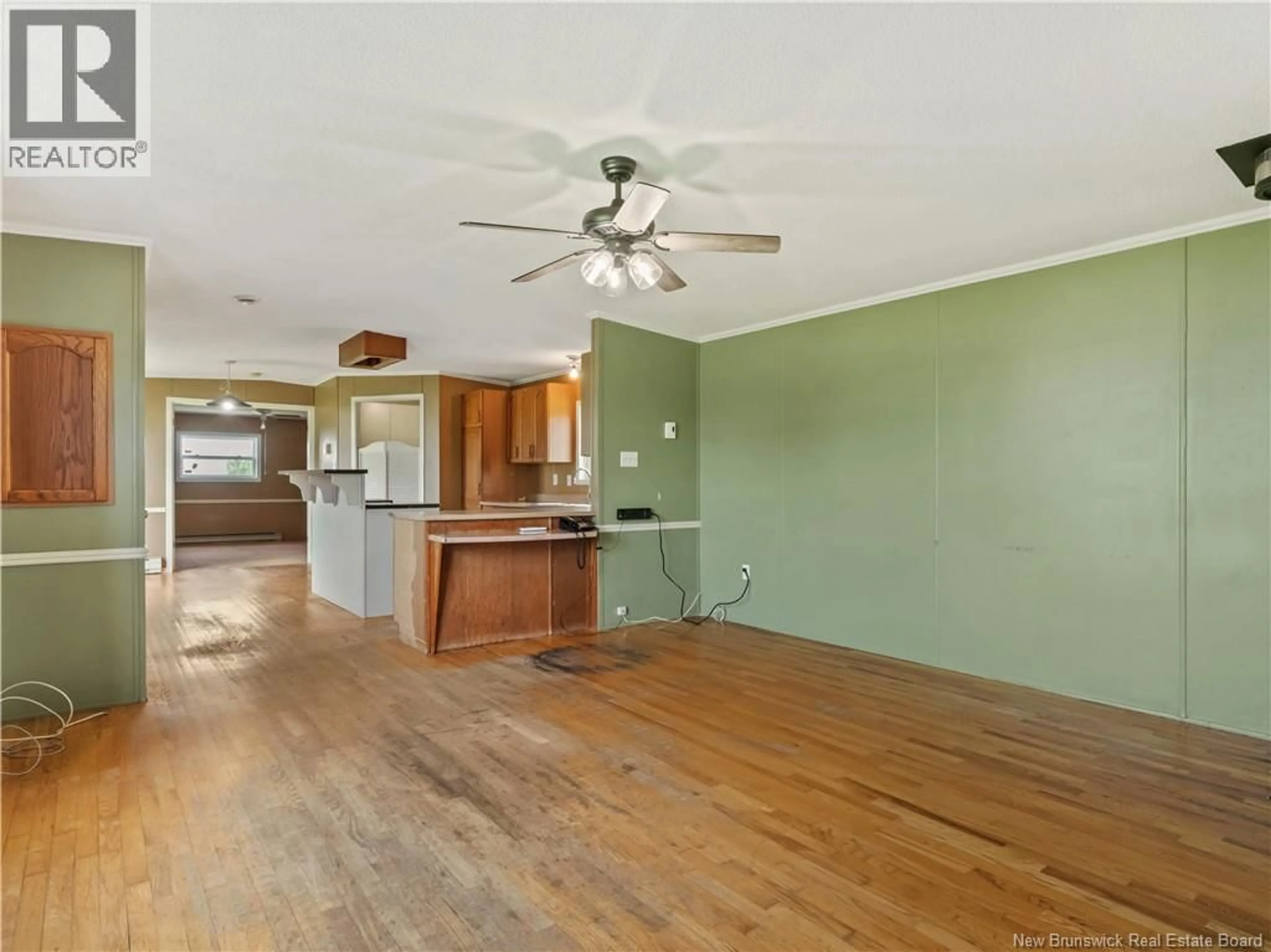 Open concept kitchen, wood/laminate floor for 3975 ROUTE 515, Sainte-Marie-De-Kent New Brunswick E4S2C5