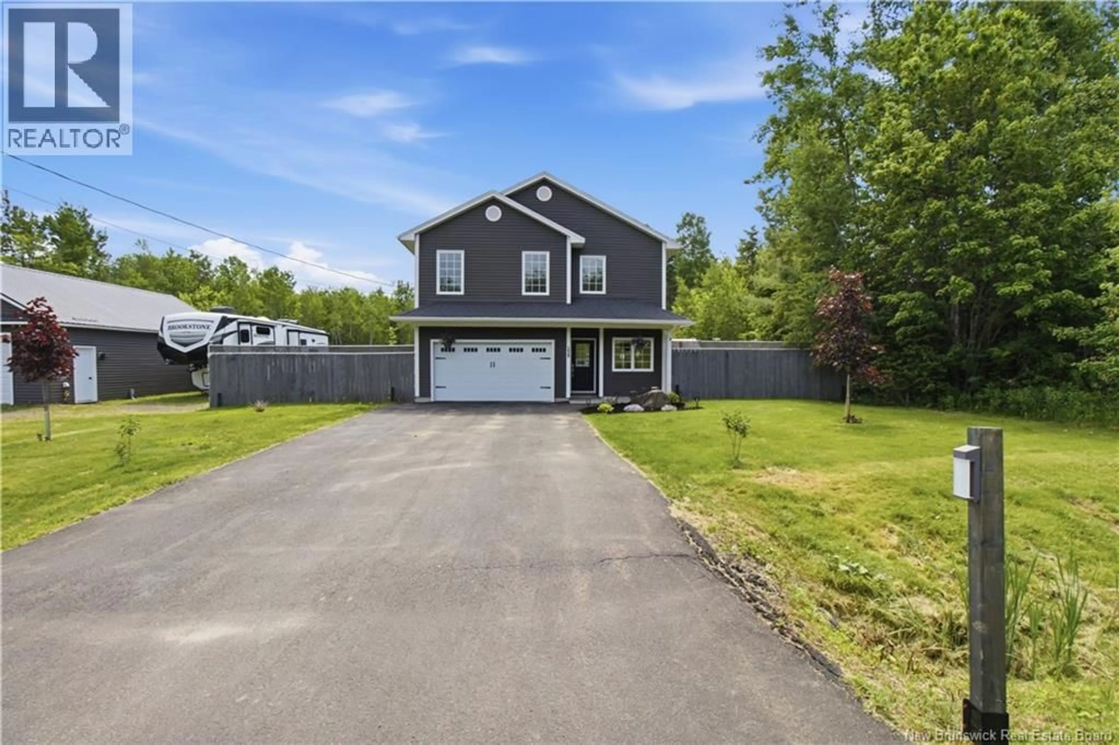 A pic from outside/outdoor area/front of a property/back of a property/a pic from drone, street for 239 GARDEN GROVE, Lincoln New Brunswick E3B7G8
