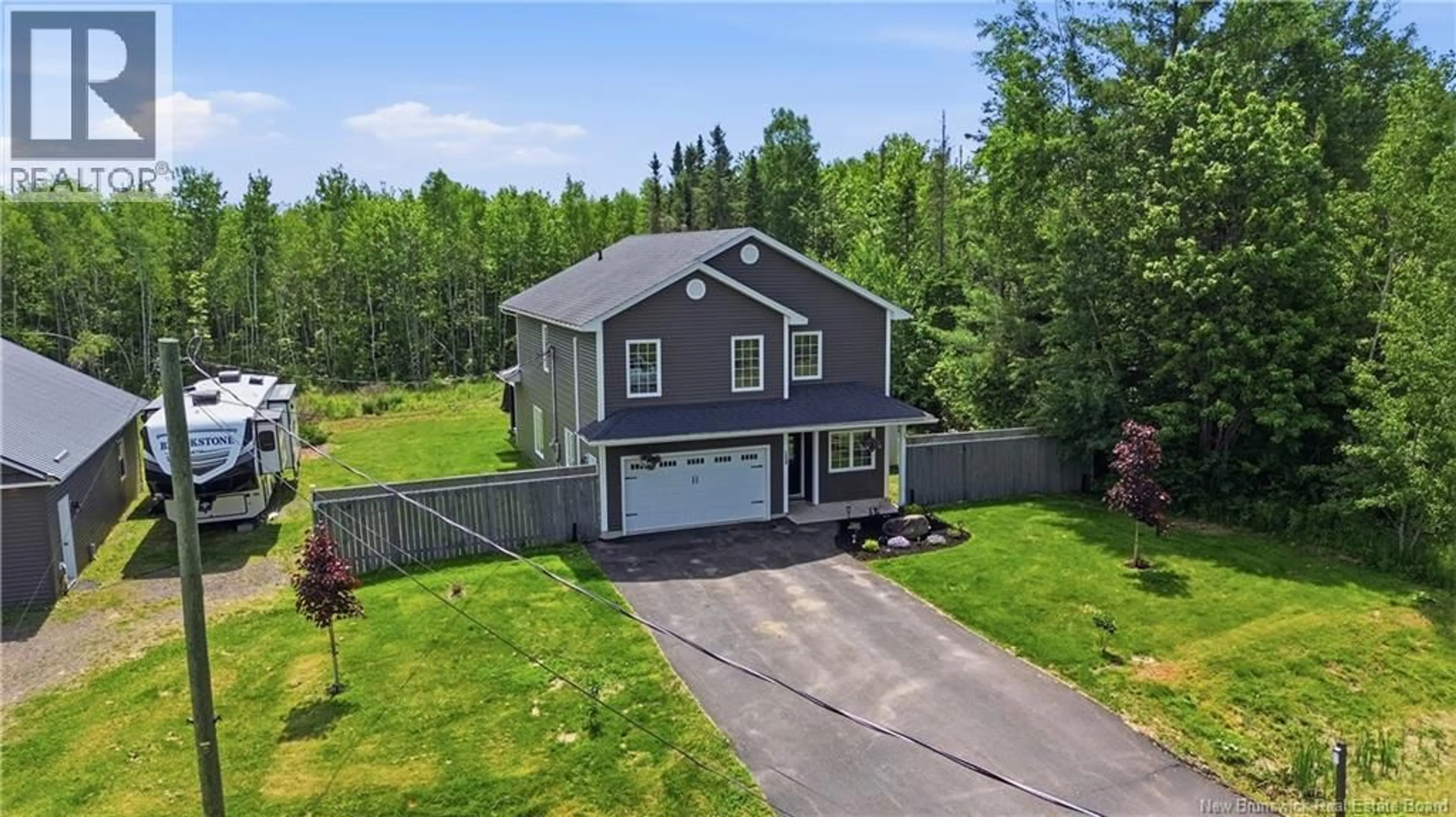 A pic from outside/outdoor area/front of a property/back of a property/a pic from drone, street for 239 GARDEN GROVE, Lincoln New Brunswick E3B7G8