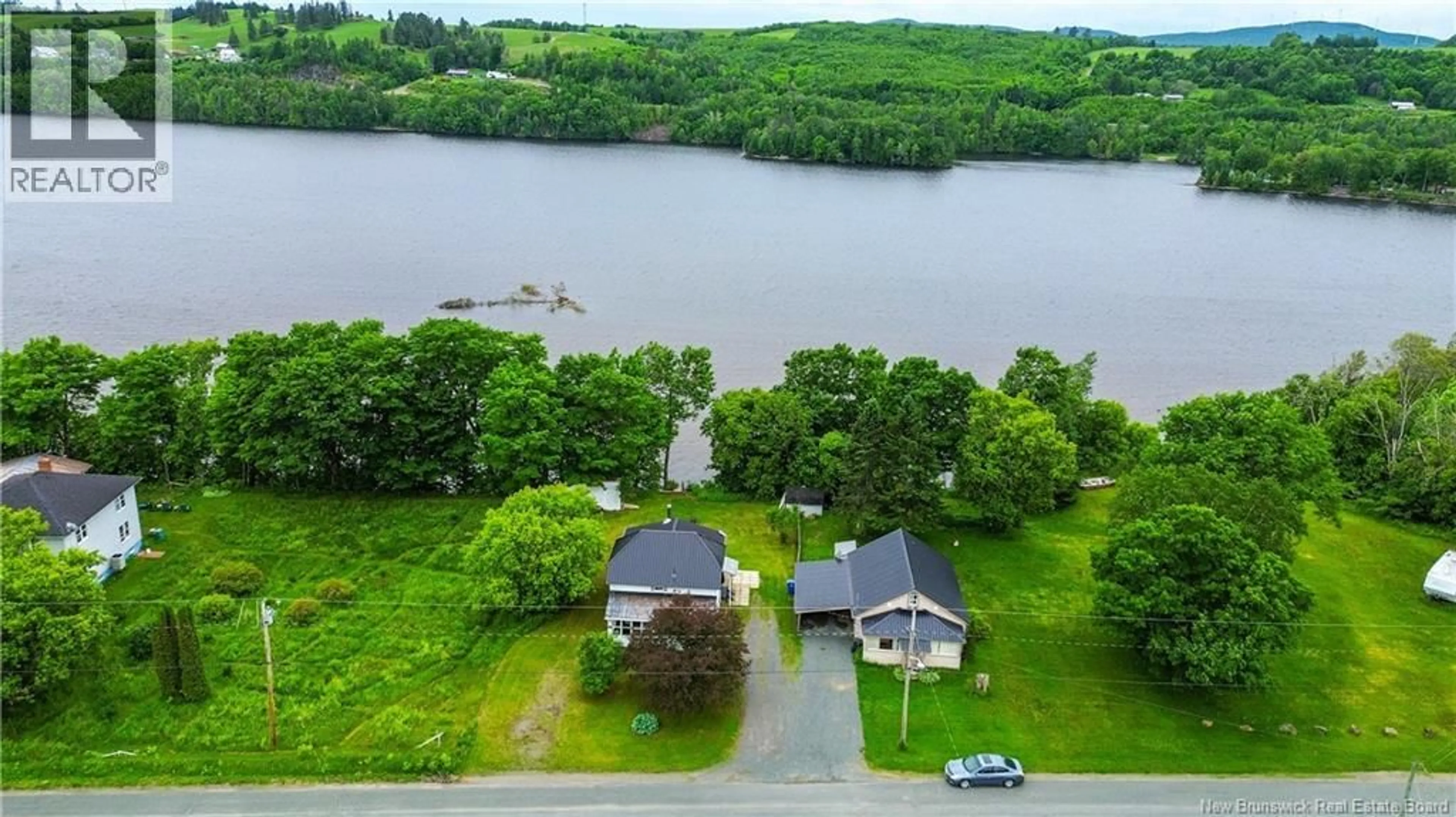 A pic from outside/outdoor area/front of a property/back of a property/a pic from drone, water/lake/river/ocean view for 205 UPPER KENT ROAD, Upper Kent New Brunswick E7J2E3
