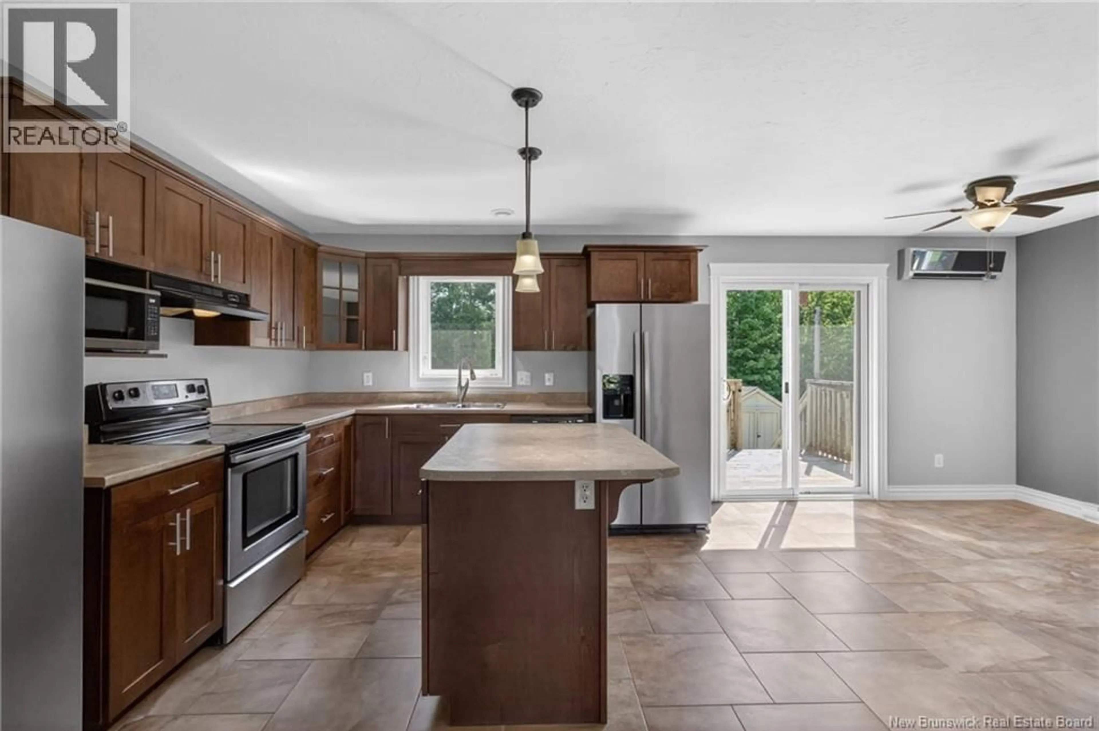 Open concept kitchen, ceramic/tile floor for 57 WHISPERWOOD DRIVE, Moncton New Brunswick E1G0P7
