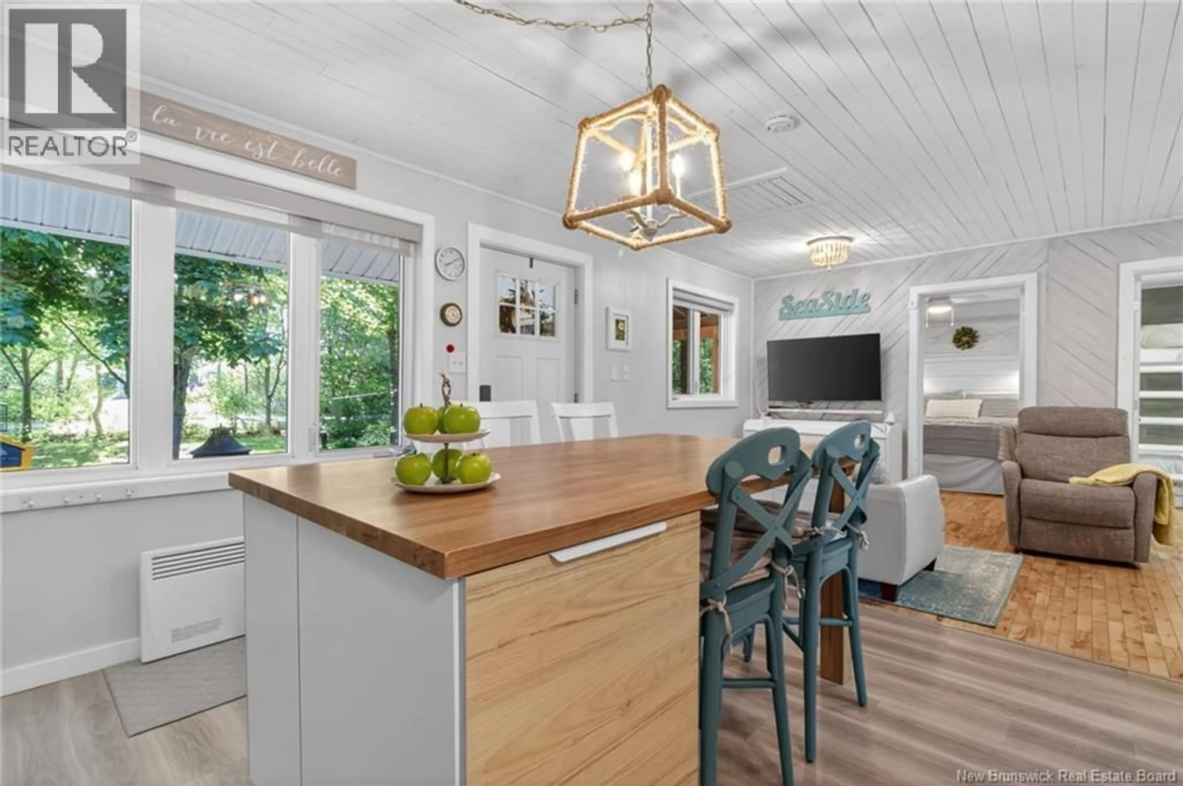 Open concept kitchen, wood/laminate floor for 50 CYRIL, Trois Ruisseaux New Brunswick E4N2Y3