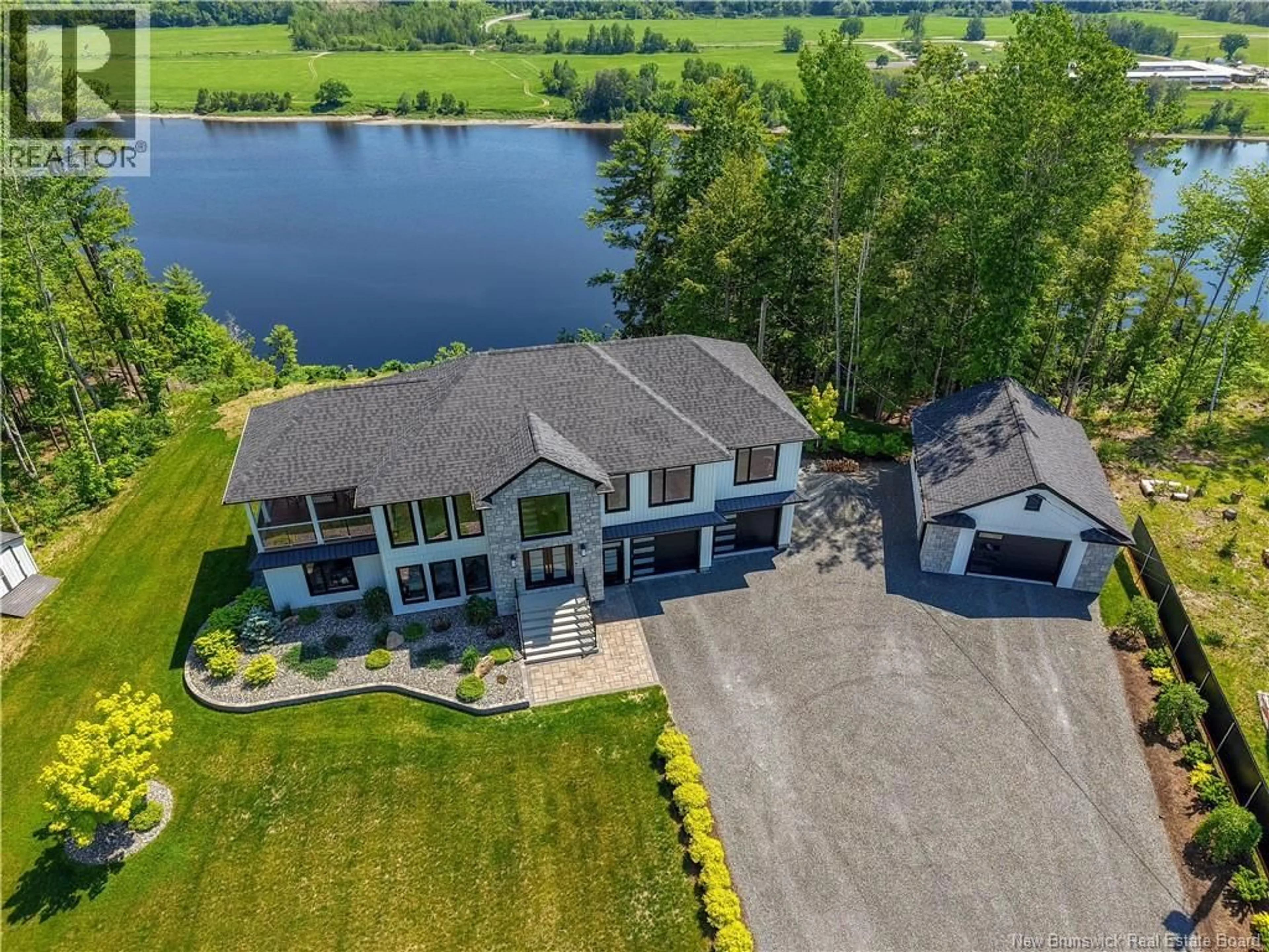 A pic from outside/outdoor area/front of a property/back of a property/a pic from drone, water/lake/river/ocean view for 230 CROCKS POINT ROAD, Keswick Ridge New Brunswick E6L1T7
