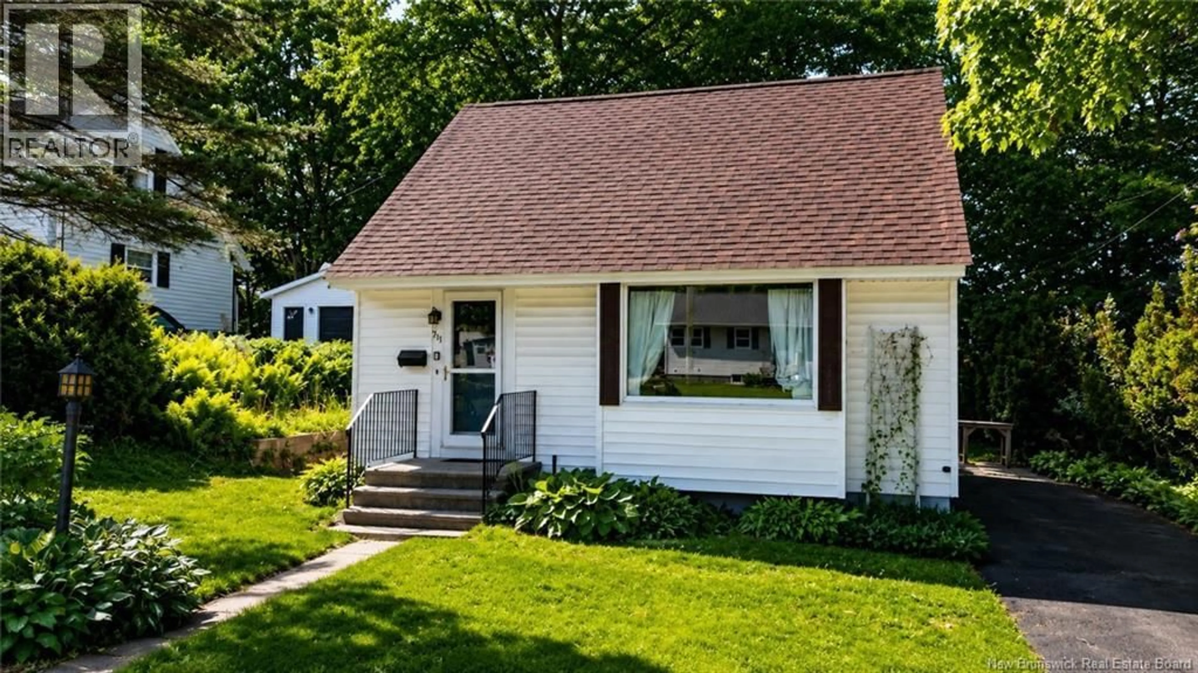 Home with vinyl exterior material, street for 711 REID STREET, Fredericton New Brunswick E3B3V6