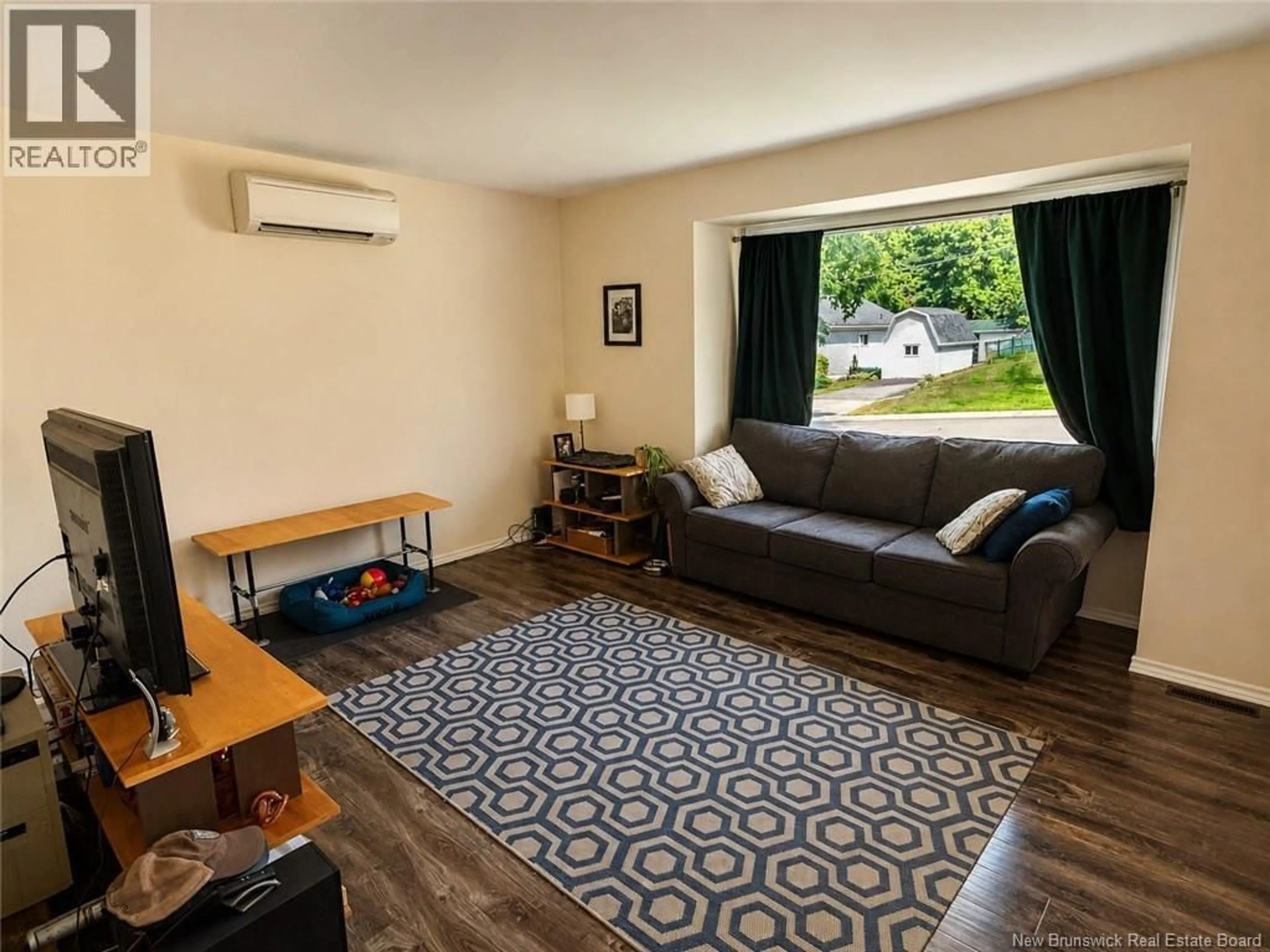 Living room with furniture, unknown for 711 REID STREET, Fredericton New Brunswick E3B3V6