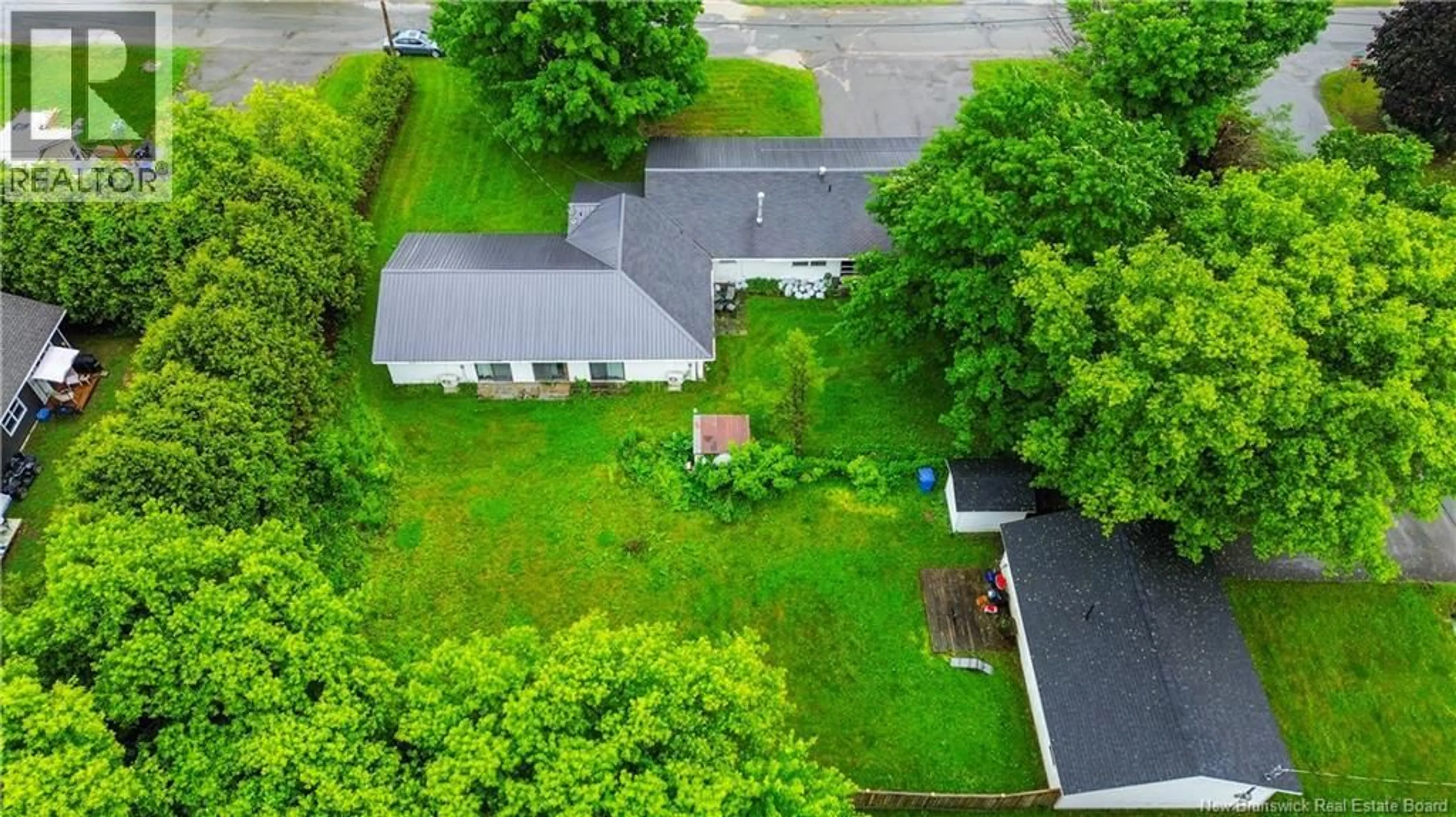 A pic from outside/outdoor area/front of a property/back of a property/a pic from drone, street for 140 WENTWORTH STREET, Woodstock New Brunswick E7M2Z7