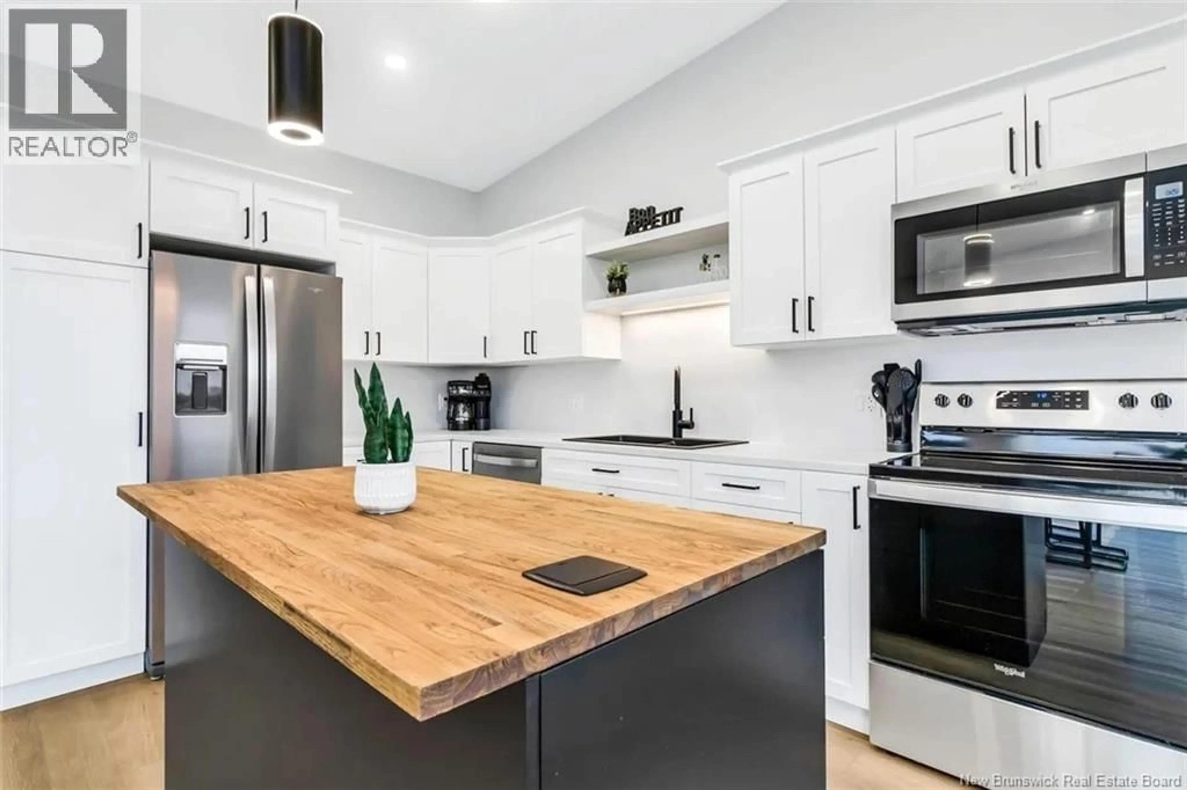 Open concept kitchen, wood/laminate floor for 89-91 YORK, Richibucto New Brunswick E4W4K2
