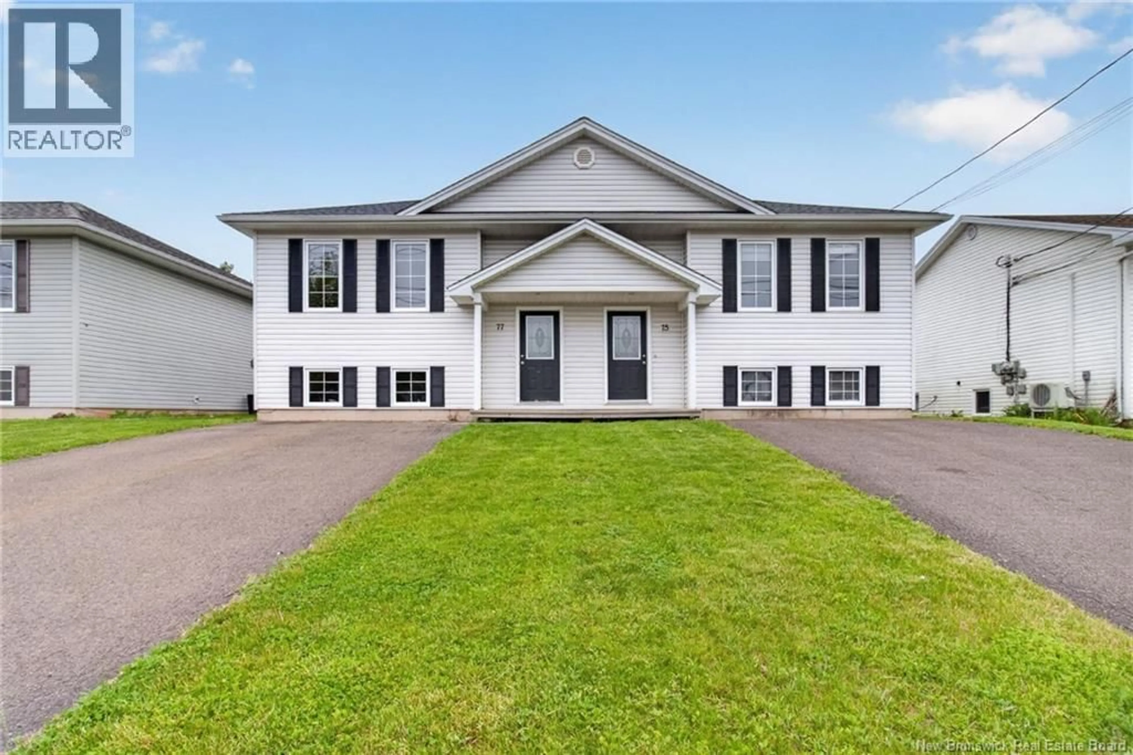 Home with vinyl exterior material, building for 75-77 HEMMER JANE, Moncton New Brunswick E1G2H4