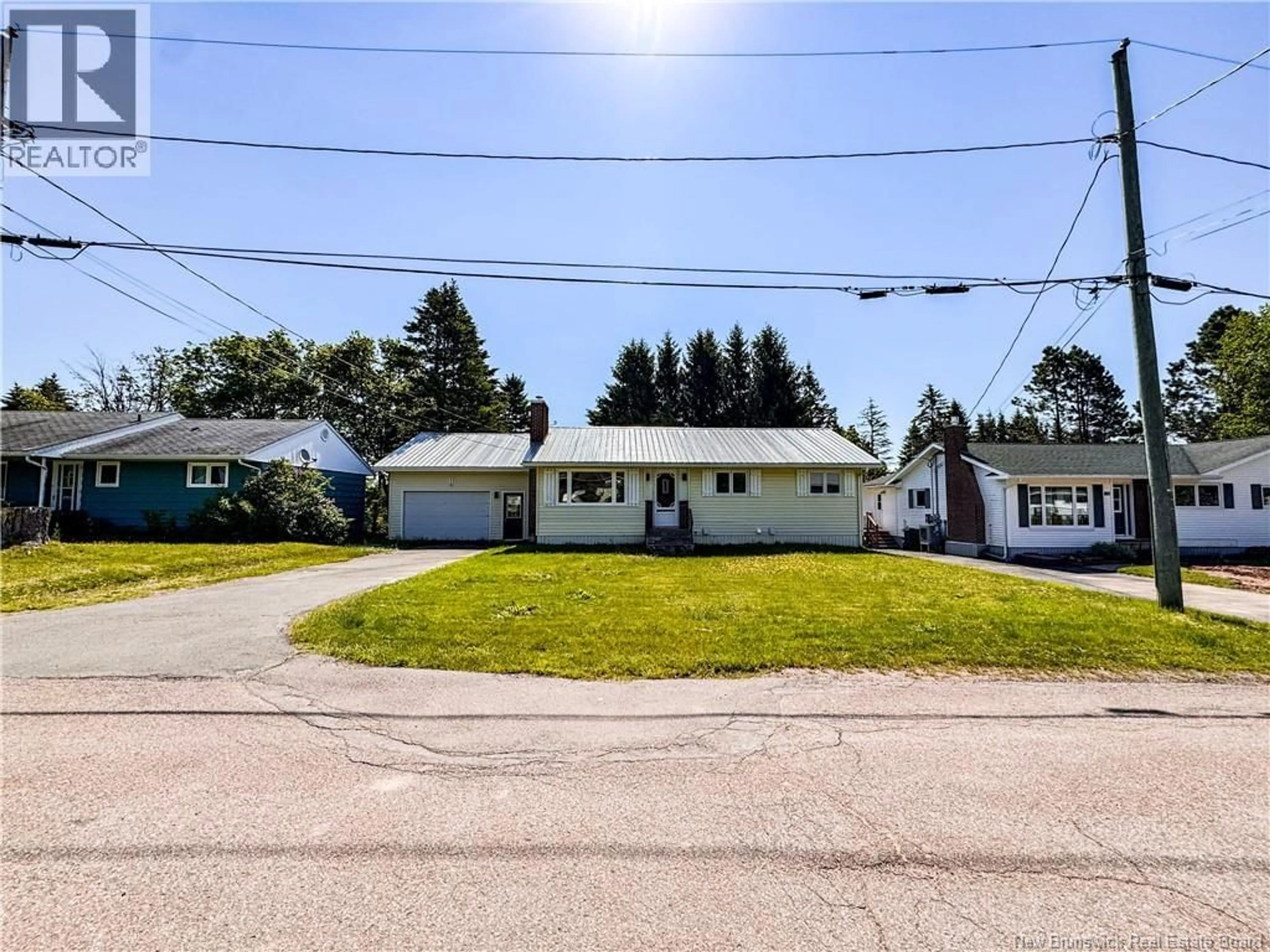 A pic from outside/outdoor area/front of a property/back of a property/a pic from drone, street for 16 BICKERTON AVENUE, Sackville New Brunswick E4L3M7
