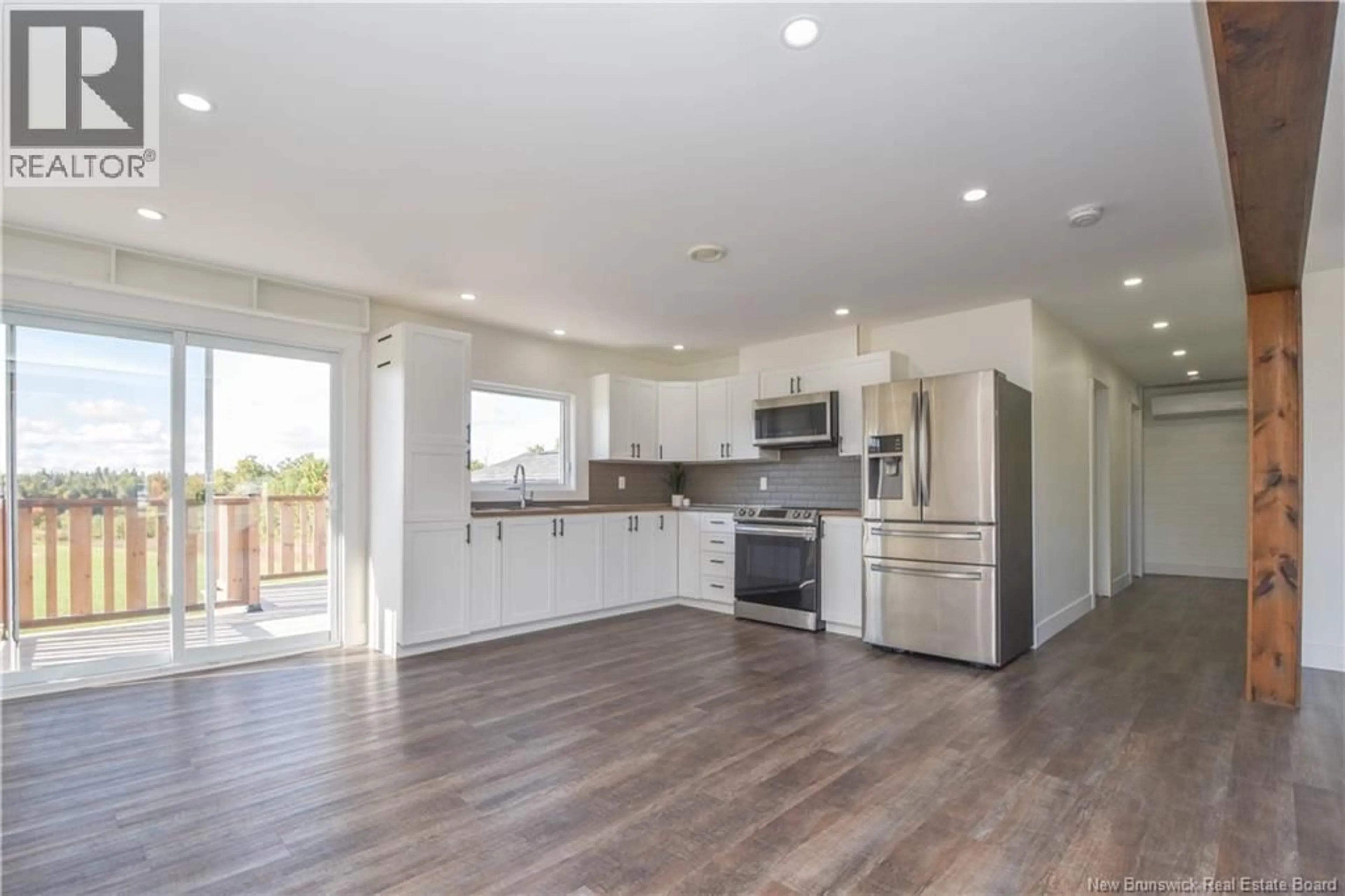 Open concept kitchen, wood/laminate floor for 420 ROUTE 345, Évangéline New Brunswick E8P1T8
