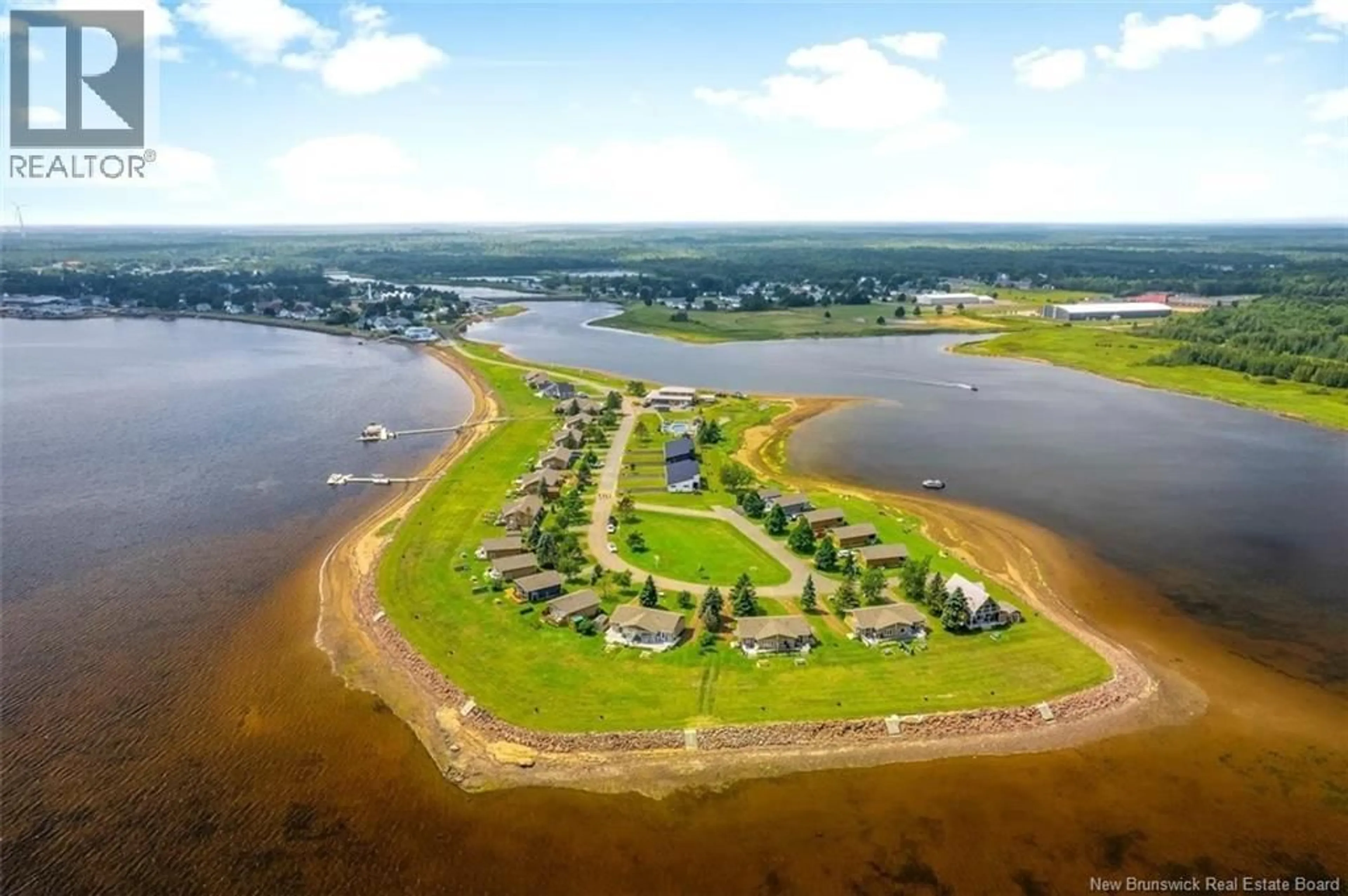 A pic from outside/outdoor area/front of a property/back of a property/a pic from drone, water/lake/river/ocean view for 97-99 YORK, Richibucto New Brunswick E4W4K2