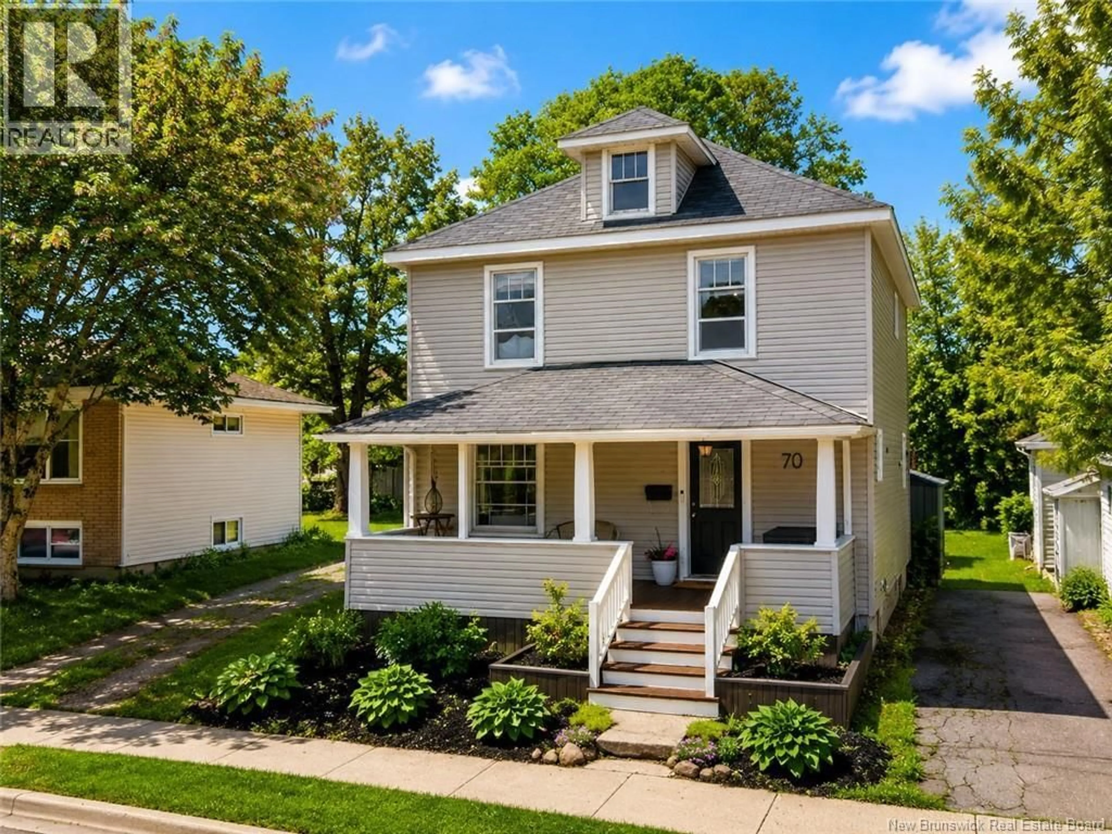 Home with vinyl exterior material, street for 70 MAPLE STREET, Moncton New Brunswick E1C6A3
