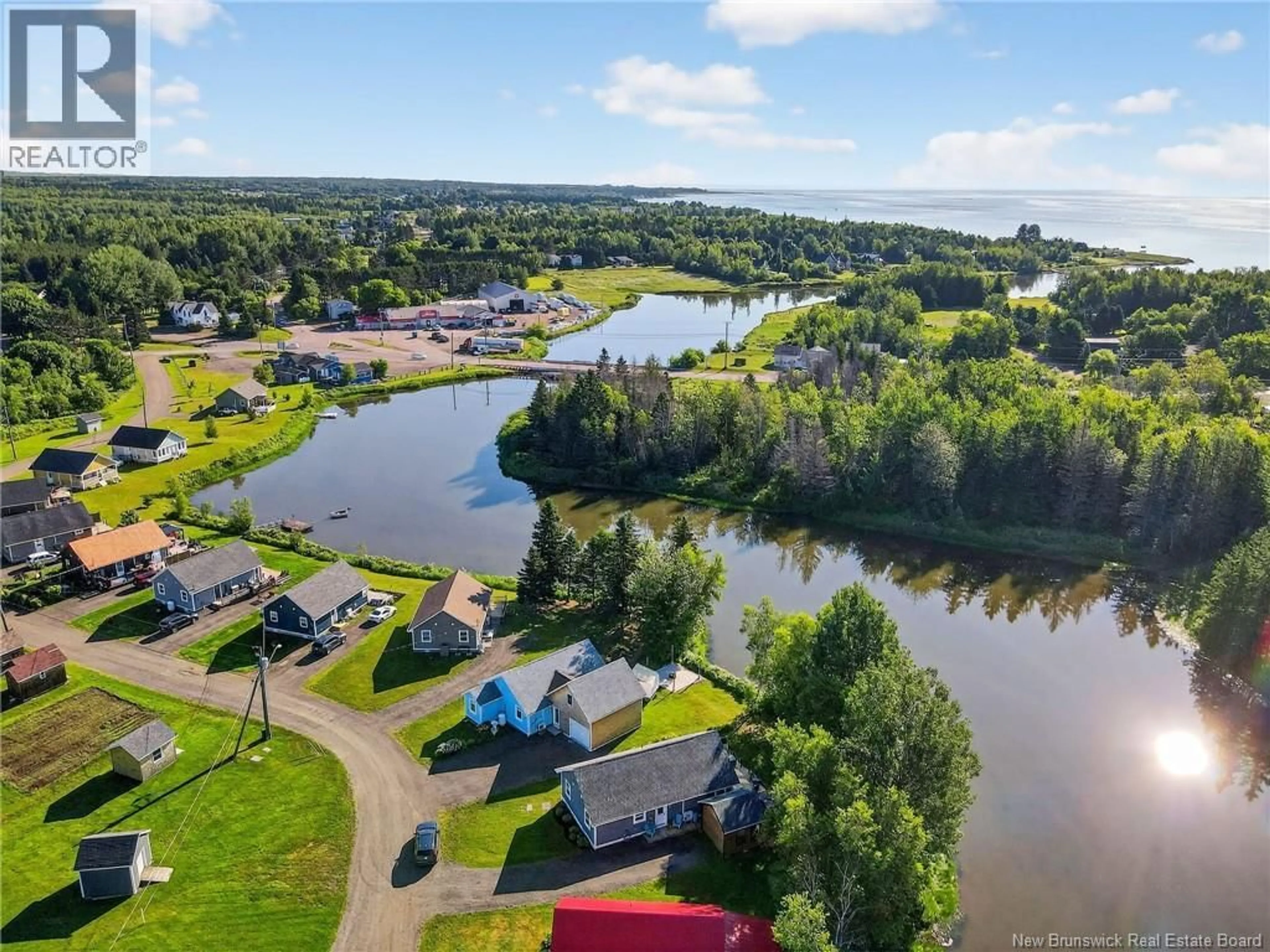 A pic from outside/outdoor area/front of a property/back of a property/a pic from drone, water/lake/river/ocean view for 44 CHANIS LANE, Grande-Digue New Brunswick E4R0C7