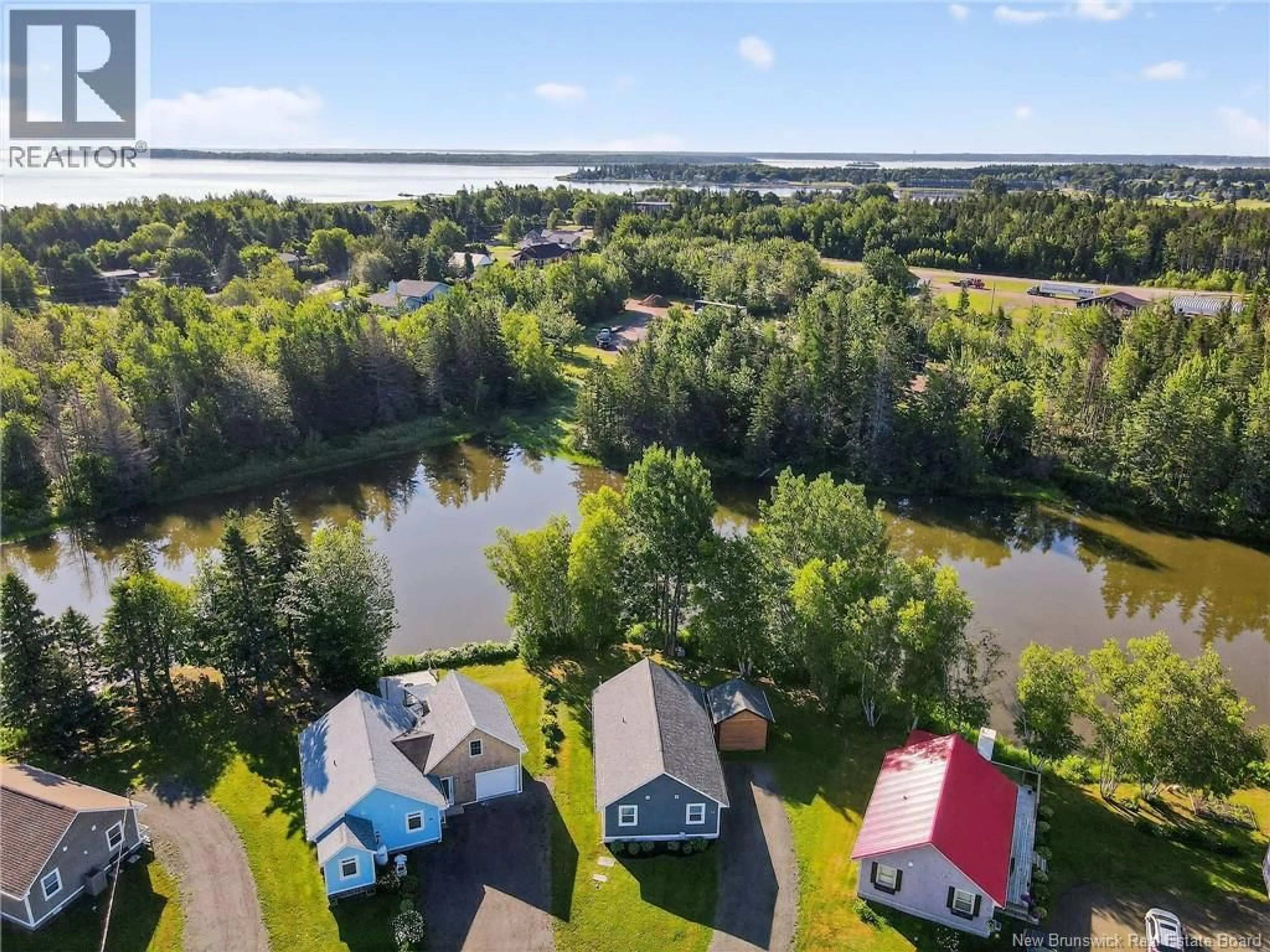 A pic from outside/outdoor area/front of a property/back of a property/a pic from drone, water/lake/river/ocean view for 44 CHANIS LANE, Grande-Digue New Brunswick E4R0C7