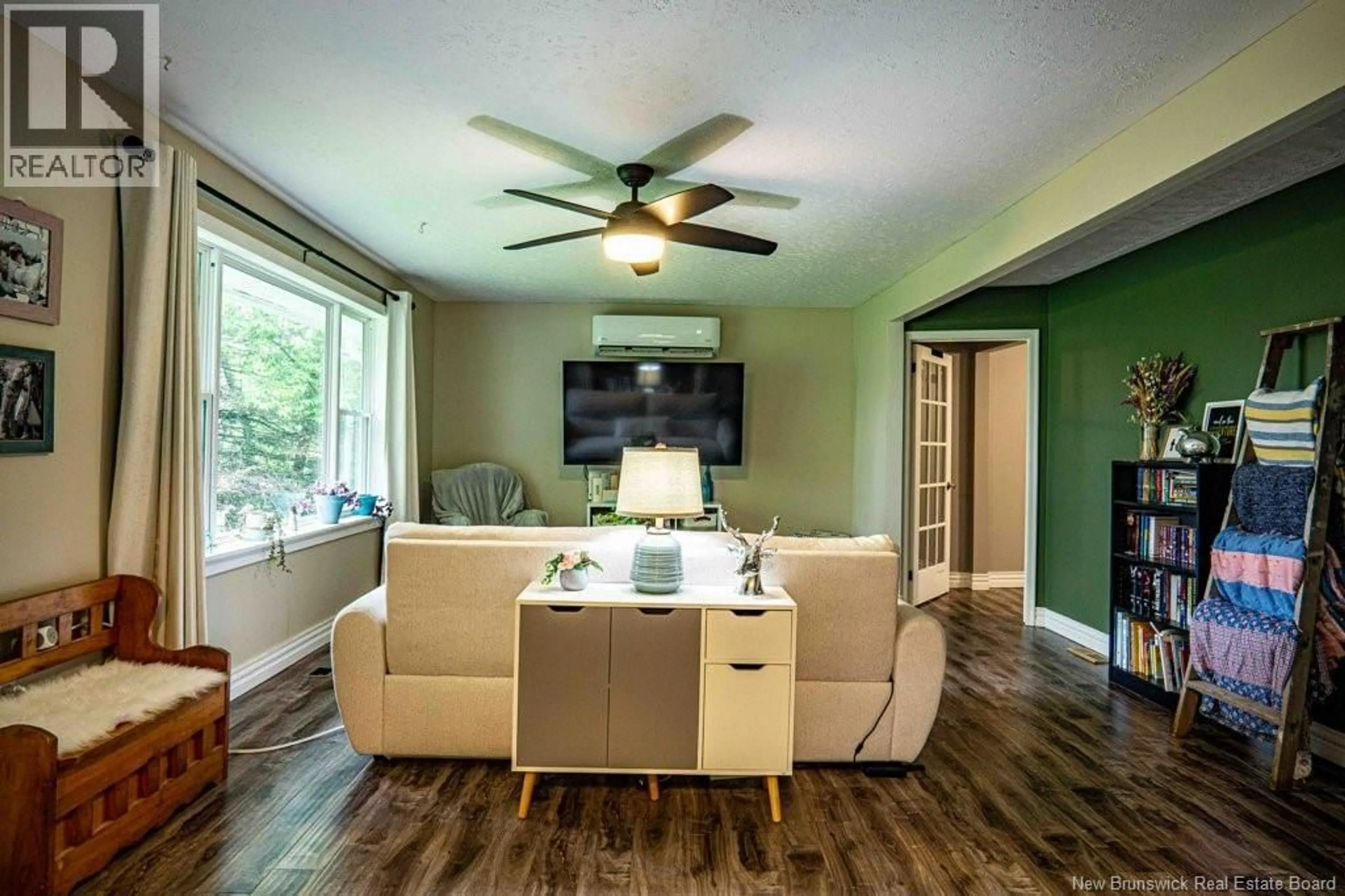 Living room with furniture, wood/laminate floor for 818 ROUTE 104, Burtts Corner New Brunswick E6L2C8