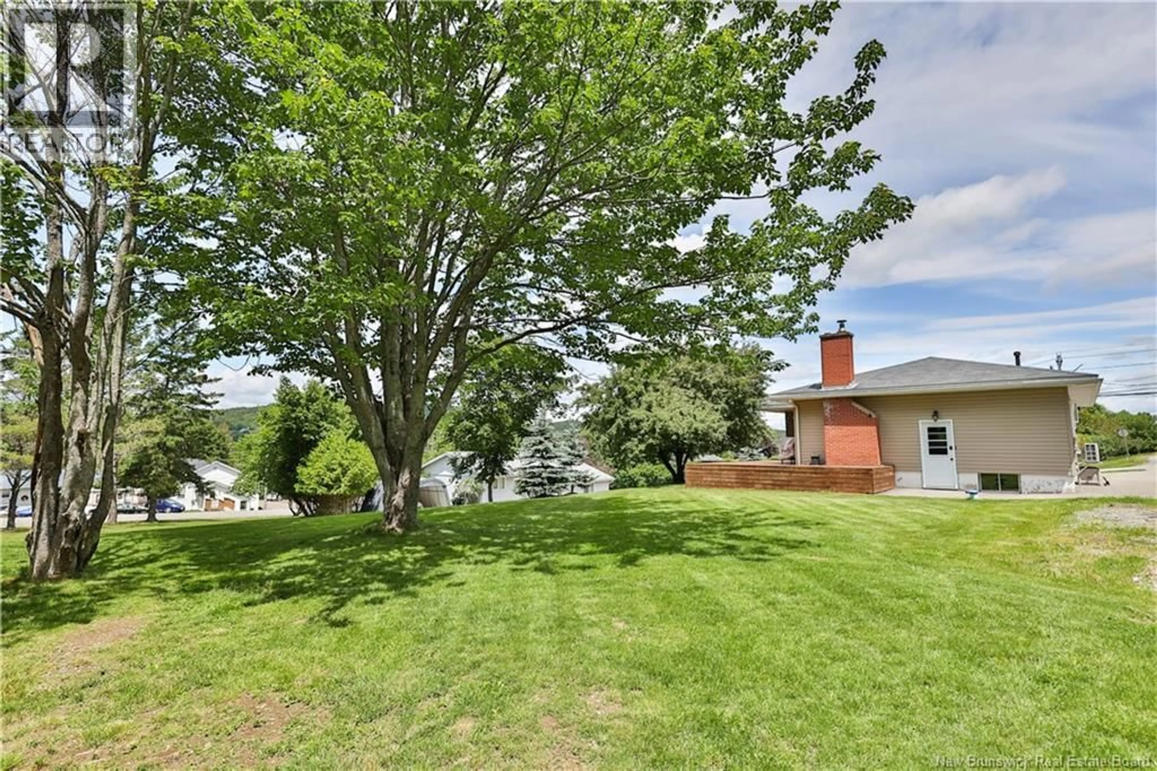 A pic from outside/outdoor area/front of a property/back of a property/a pic from drone, water/lake/river/ocean view for 18 QUISPAMSIS ROAD, Quispamsis New Brunswick E2E1M2