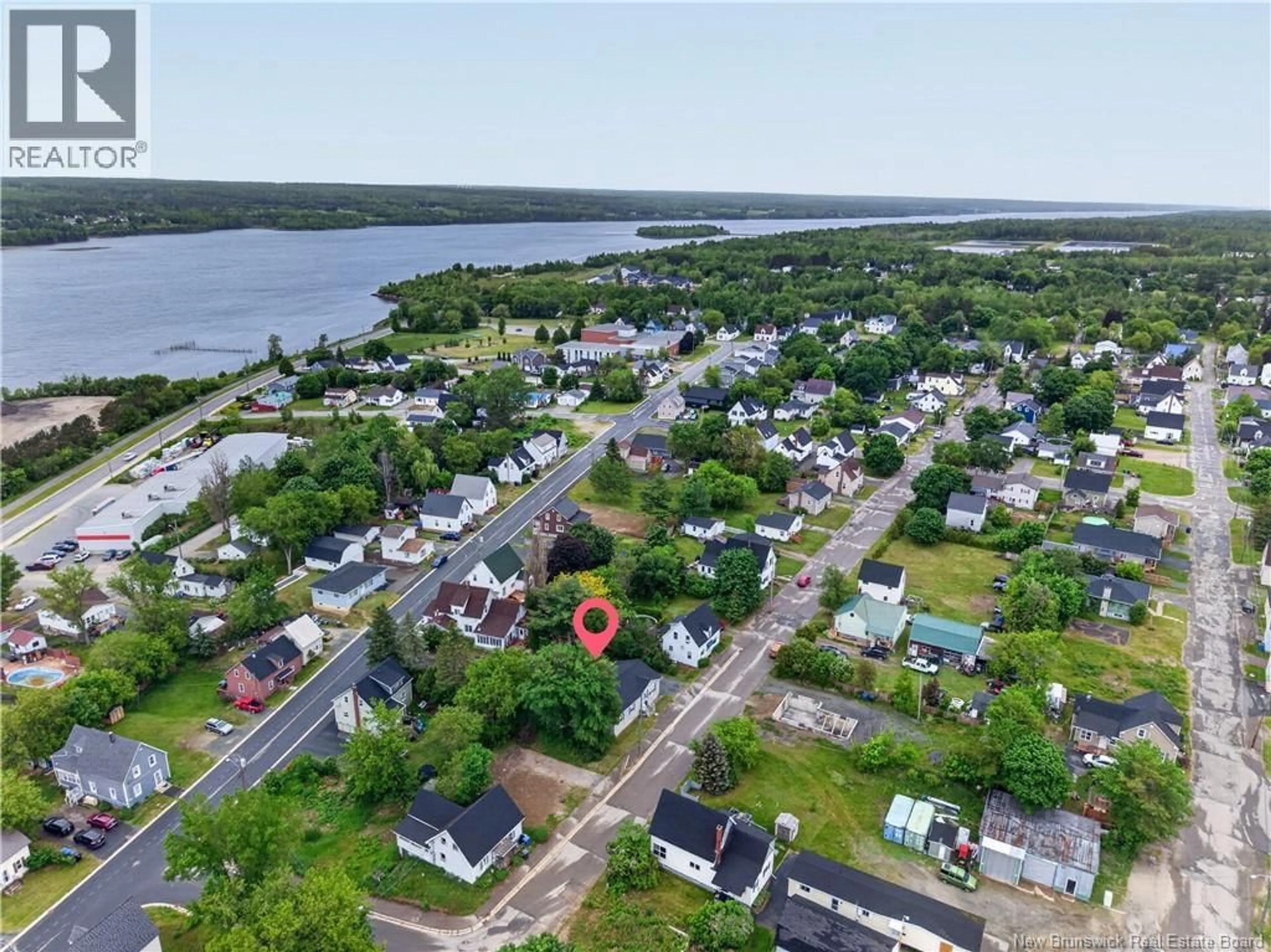 A pic from outside/outdoor area/front of a property/back of a property/a pic from drone, water/lake/river/ocean view for 17 CENTRE STREET, Miramichi New Brunswick E1N1K4
