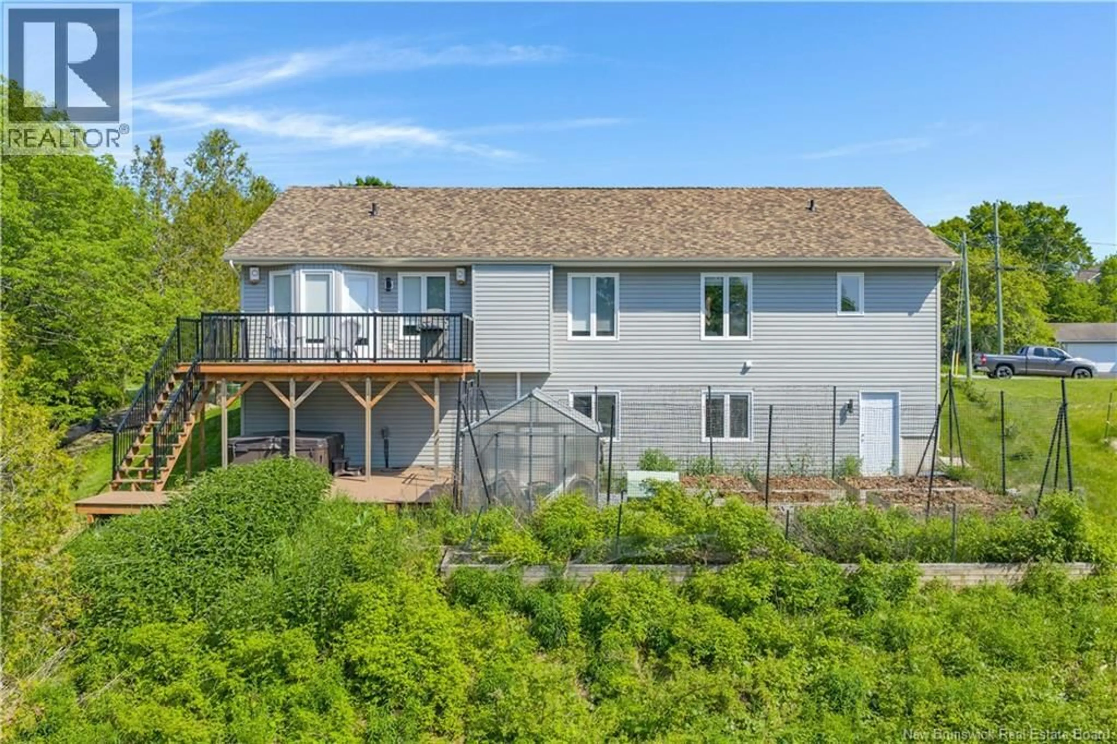 A pic from outside/outdoor area/front of a property/back of a property/a pic from drone, water/lake/river/ocean view for 23 BONANZA DRIVE, Quispamsis New Brunswick E2E1K6