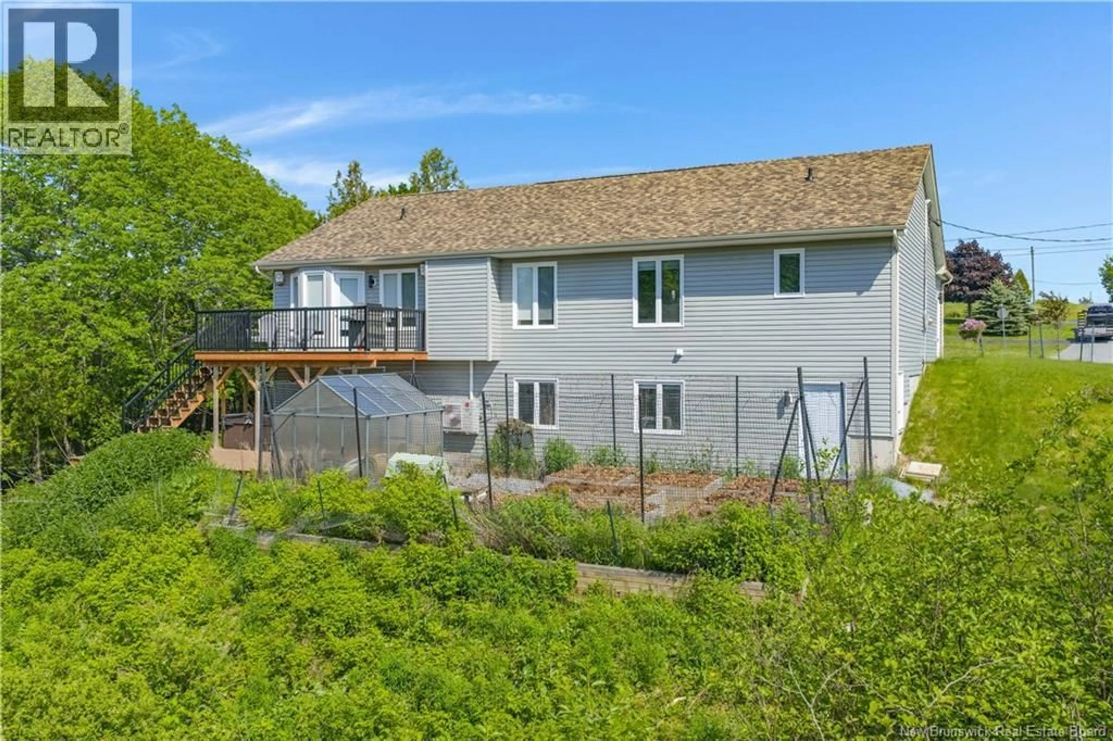 A pic from outside/outdoor area/front of a property/back of a property/a pic from drone, unknown for 23 BONANZA DRIVE, Quispamsis New Brunswick E2E1K6