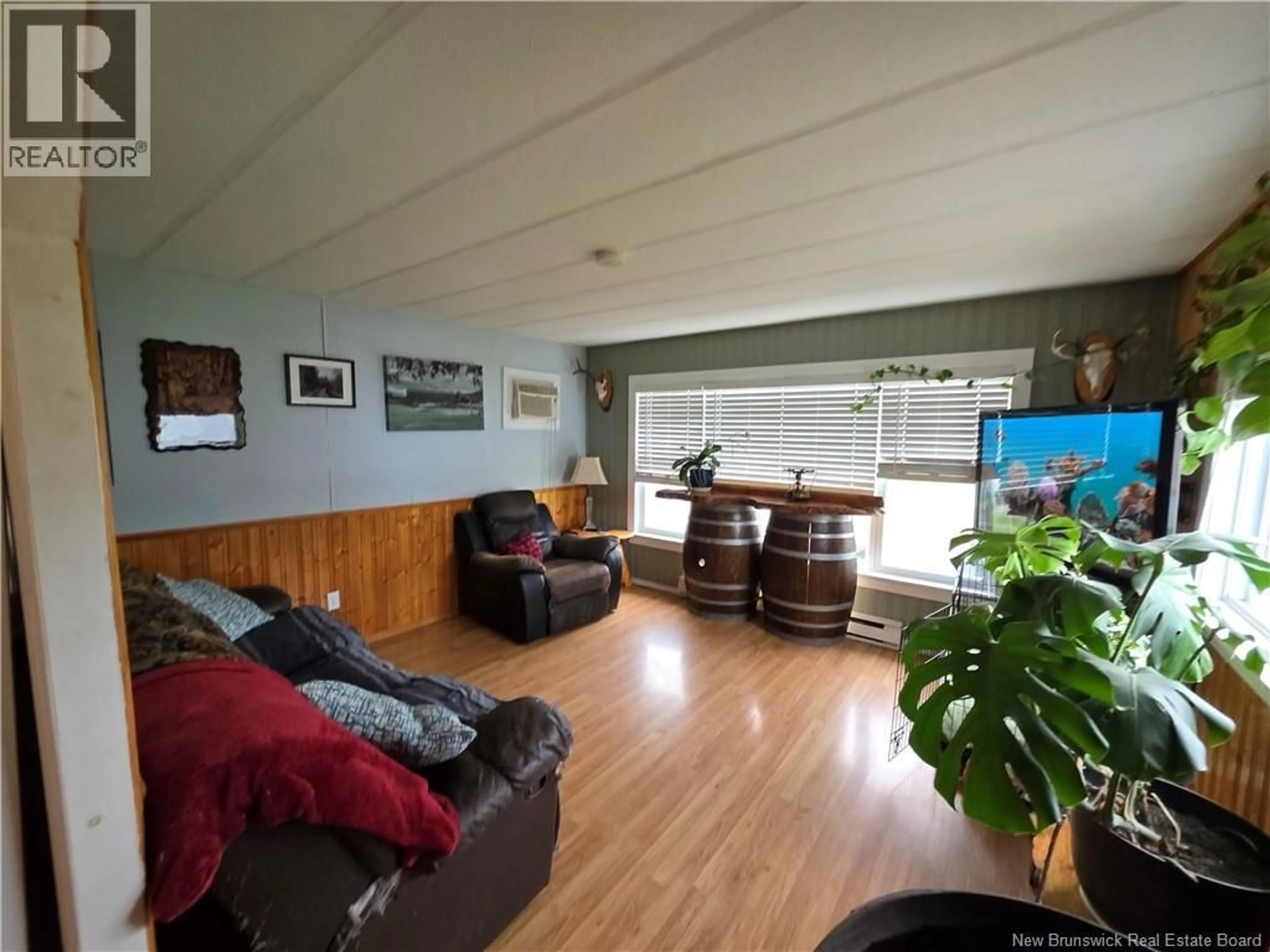 Living room with furniture, wood/laminate floor for 6 LEAFWOOD CRESCENT, Fredericton New Brunswick E3B6N7