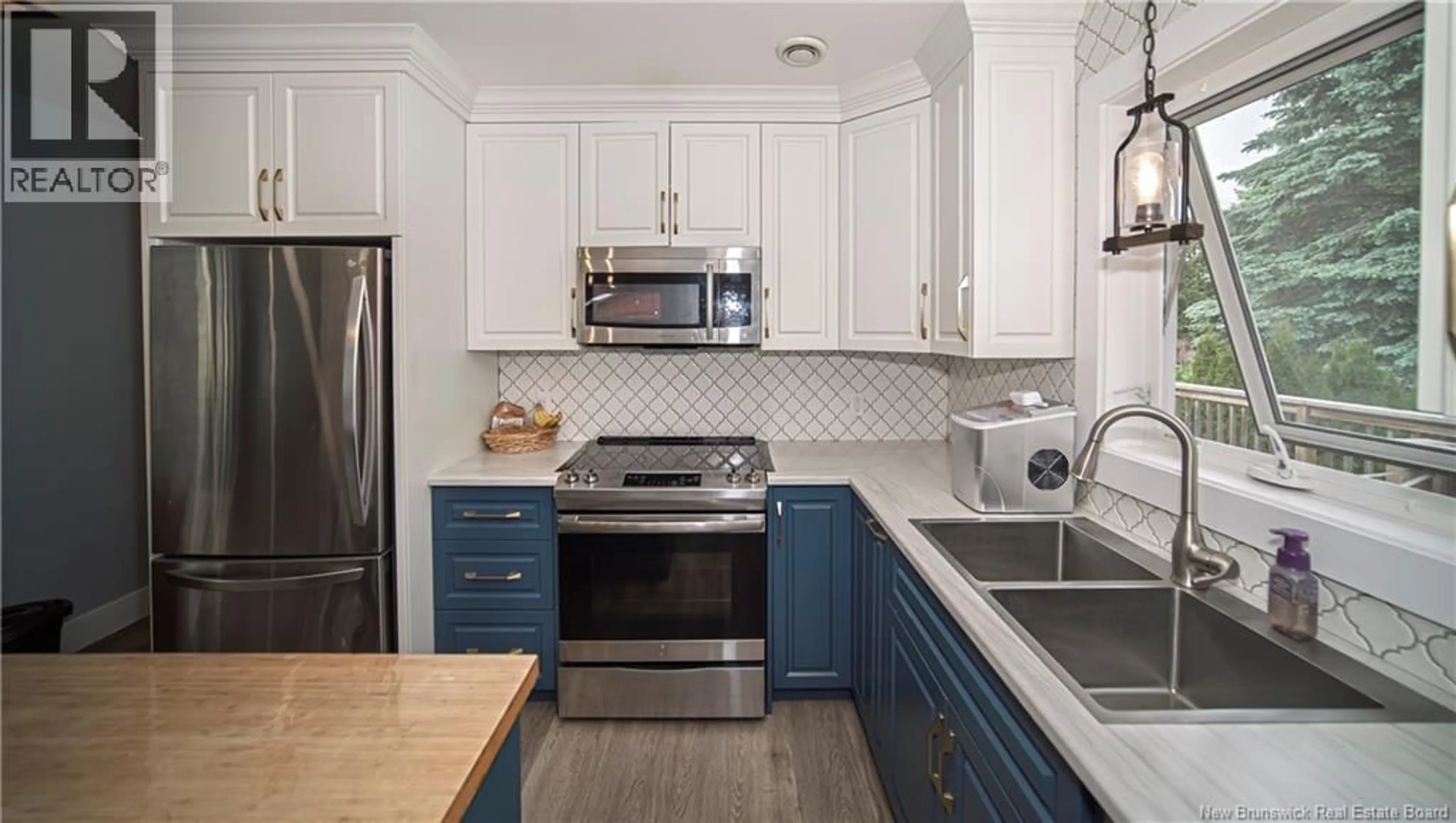 Open concept kitchen, ceramic/tile floor for 3 ONONDAGA STREET, Oromocto New Brunswick E2V1B4