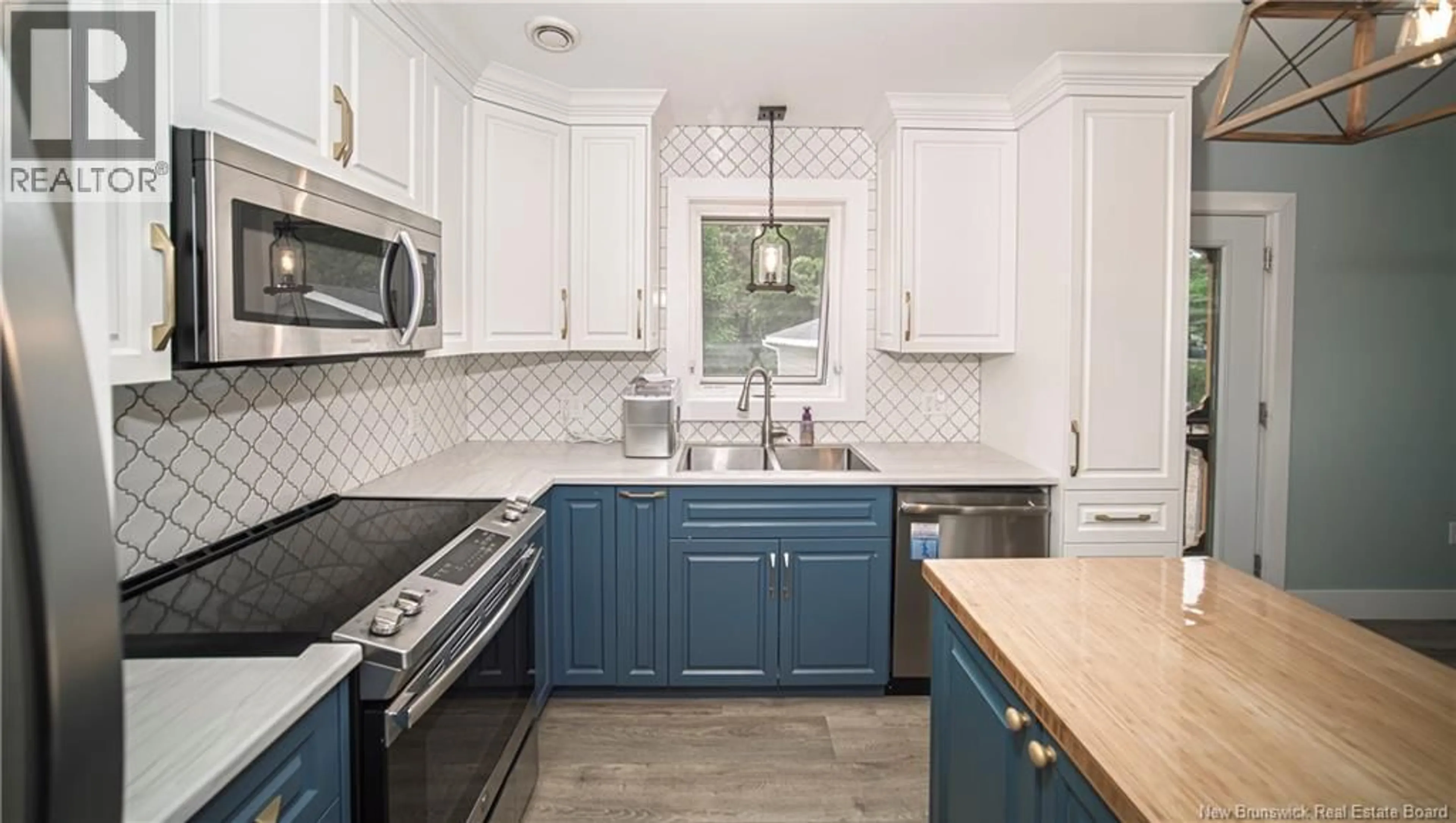 Open concept kitchen, ceramic/tile floor for 3 ONONDAGA STREET, Oromocto New Brunswick E2V1B4