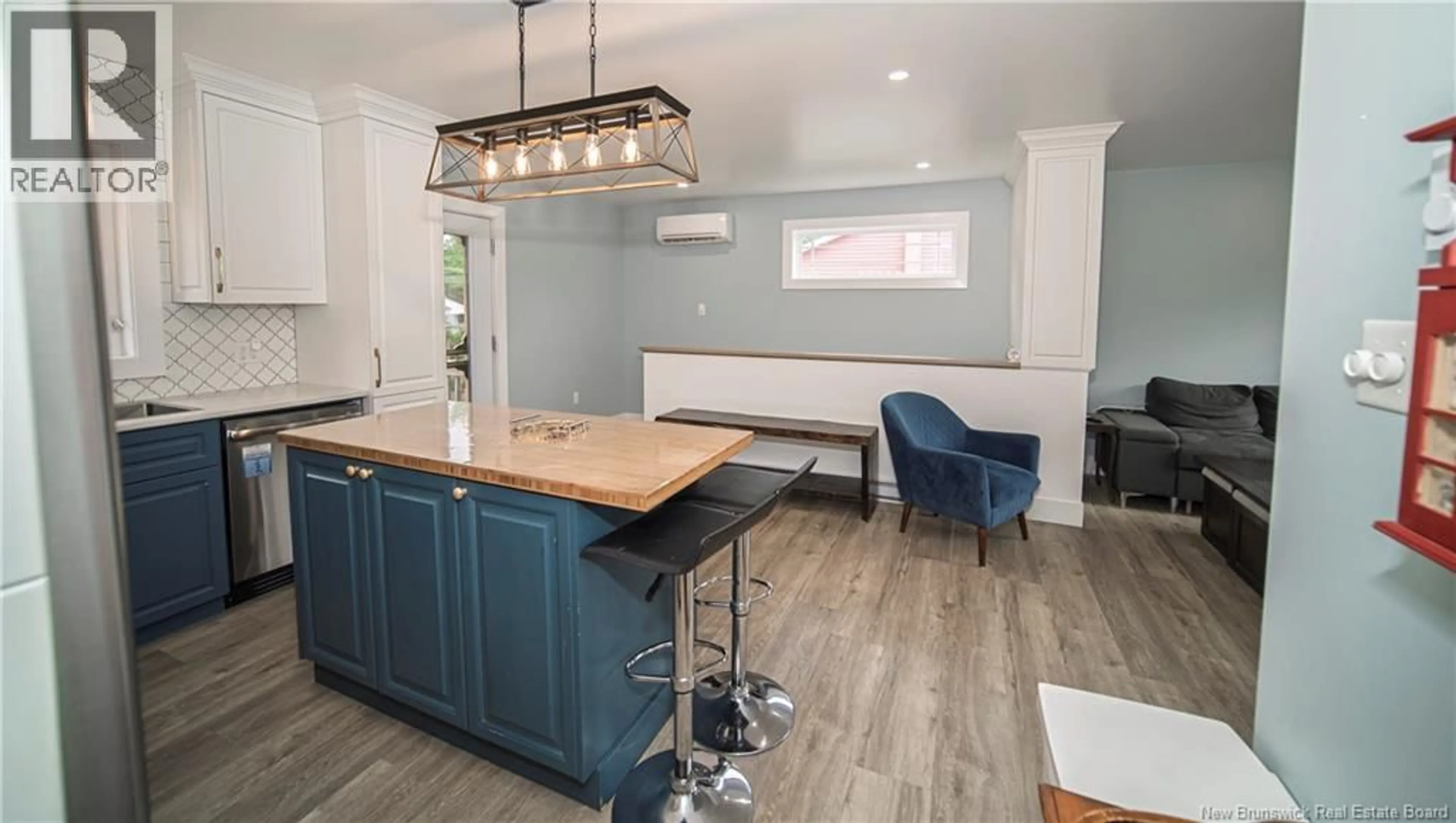 Open concept kitchen, wood/laminate floor for 3 ONONDAGA STREET, Oromocto New Brunswick E2V1B4