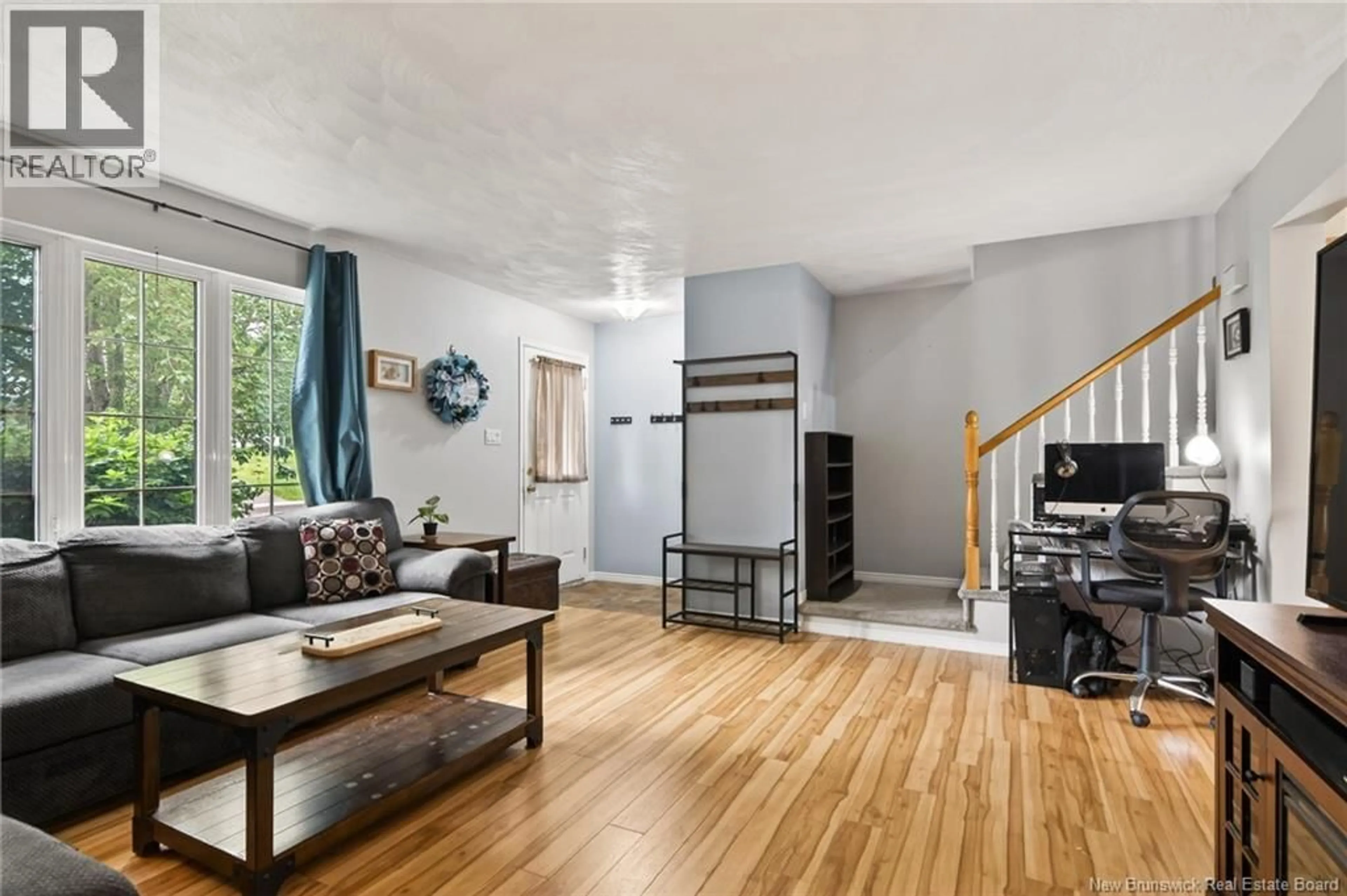 Living room with furniture, wood/laminate floor for 233 KENDRA STREET, Moncton New Brunswick E1C8Y4