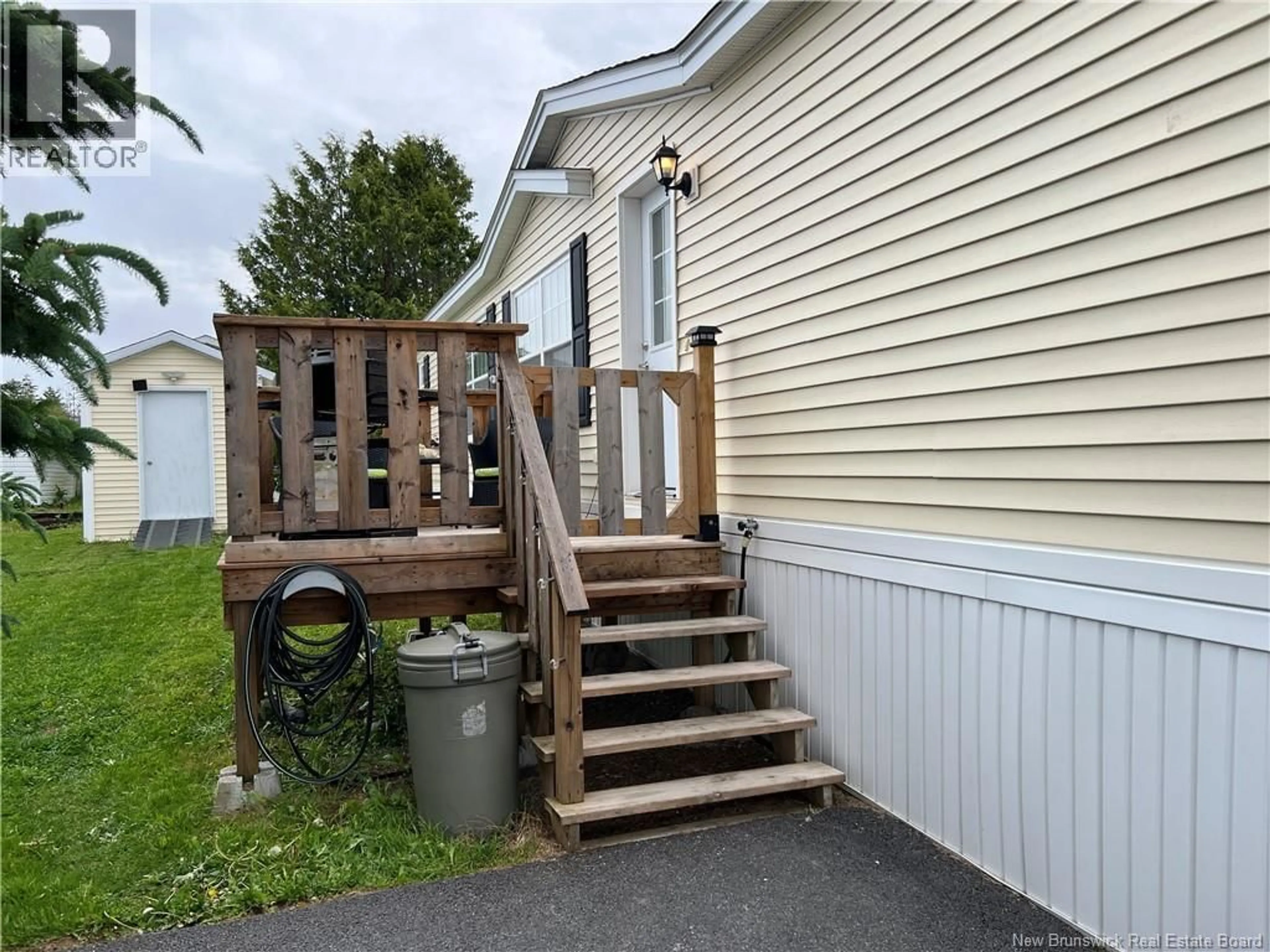 Home with vinyl exterior material, street for 8 SPRING DRIVE, Saint John New Brunswick E2N1P2
