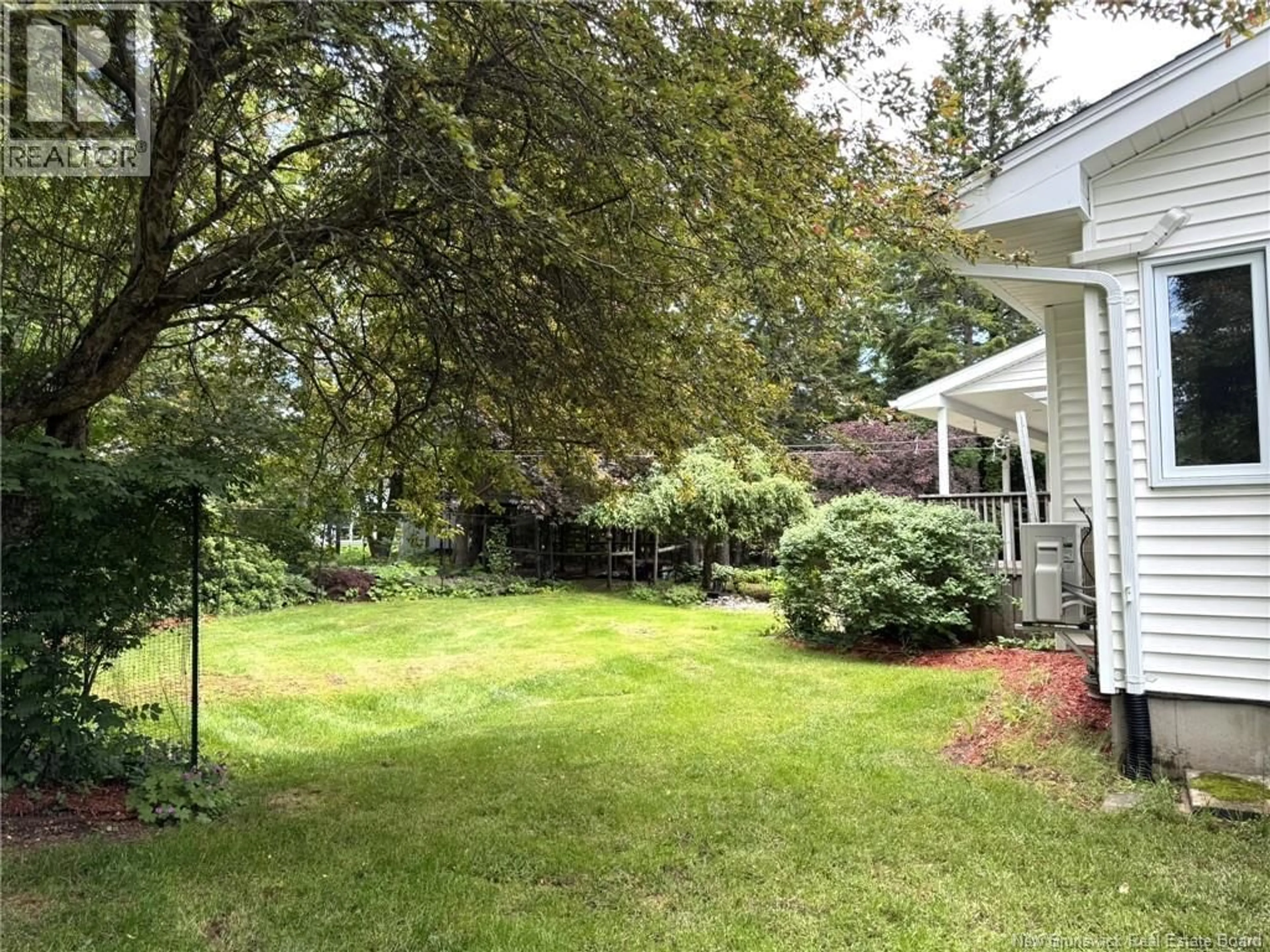 A pic from outside/outdoor area/front of a property/back of a property/a pic from drone, unknown for 28 DELMAR CRESCENT, Quispamsis New Brunswick E2E4J1