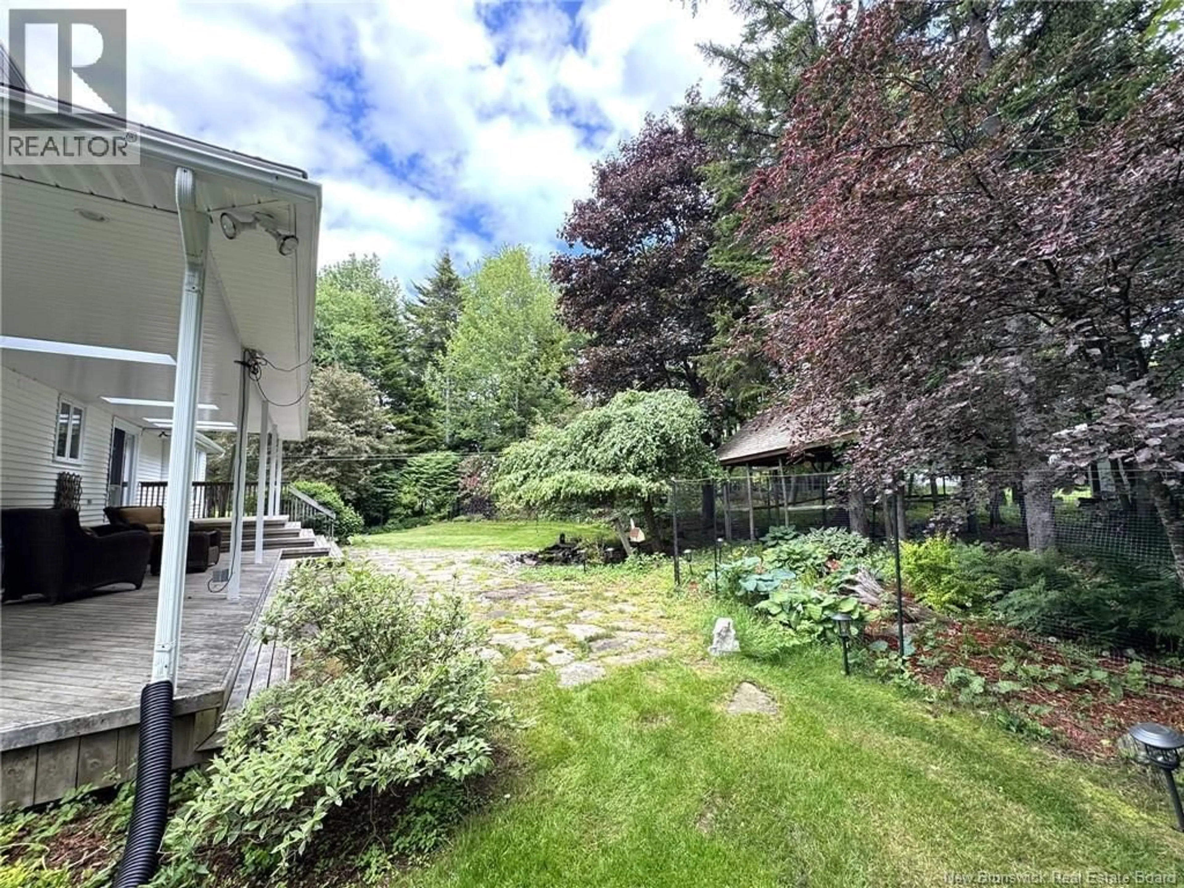 A pic from outside/outdoor area/front of a property/back of a property/a pic from drone, unknown for 28 DELMAR CRESCENT, Quispamsis New Brunswick E2E4J1