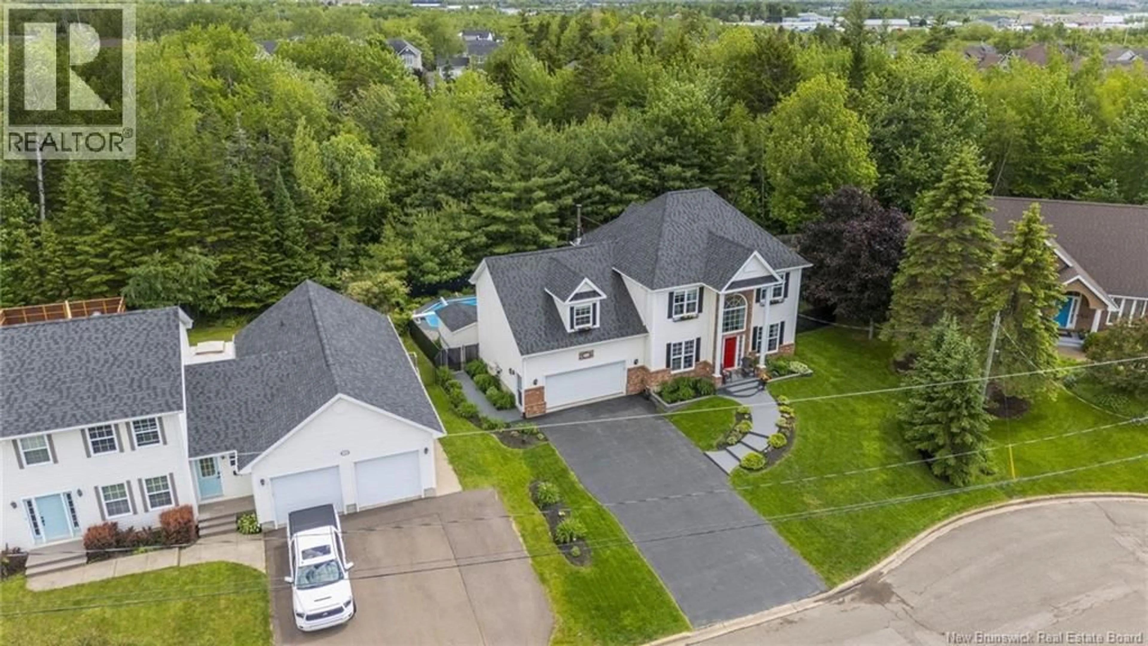 A pic from outside/outdoor area/front of a property/back of a property/a pic from drone, street for 24 MCKNIGHT COURT, Moncton New Brunswick E1A6P2