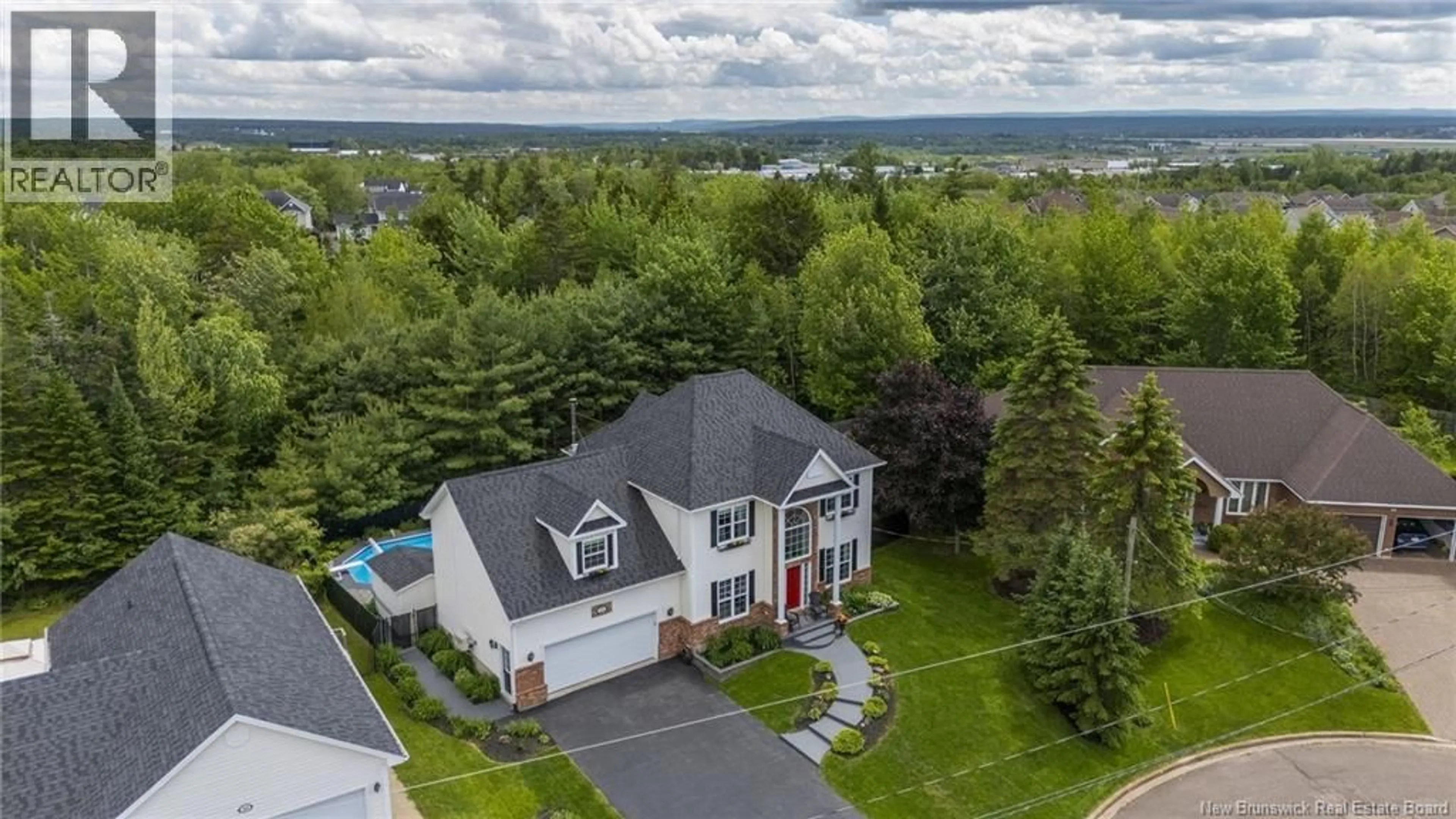 A pic from outside/outdoor area/front of a property/back of a property/a pic from drone, water/lake/river/ocean view for 24 MCKNIGHT COURT, Moncton New Brunswick E1A6P2