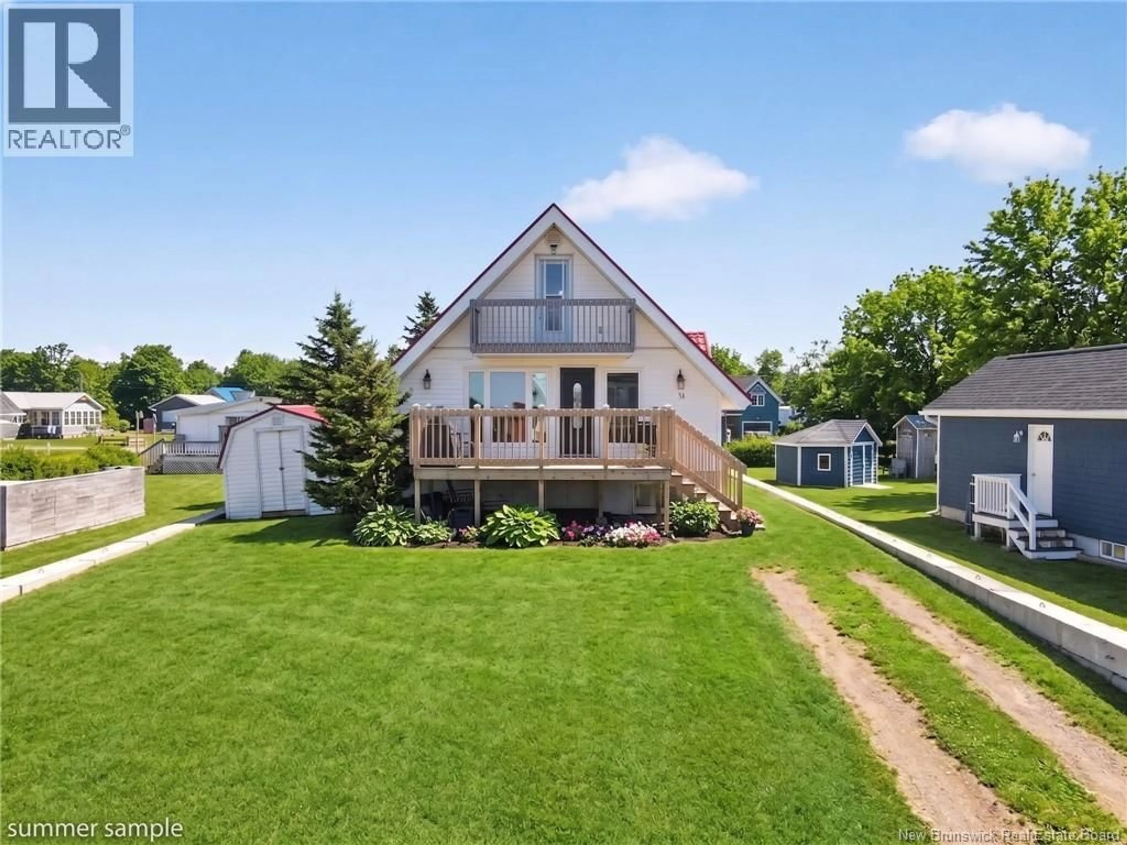 A pic from outside/outdoor area/front of a property/back of a property/a pic from drone, street for 11 SUR L' OCEAN STREET, Grand-Barachois New Brunswick E4P8N9