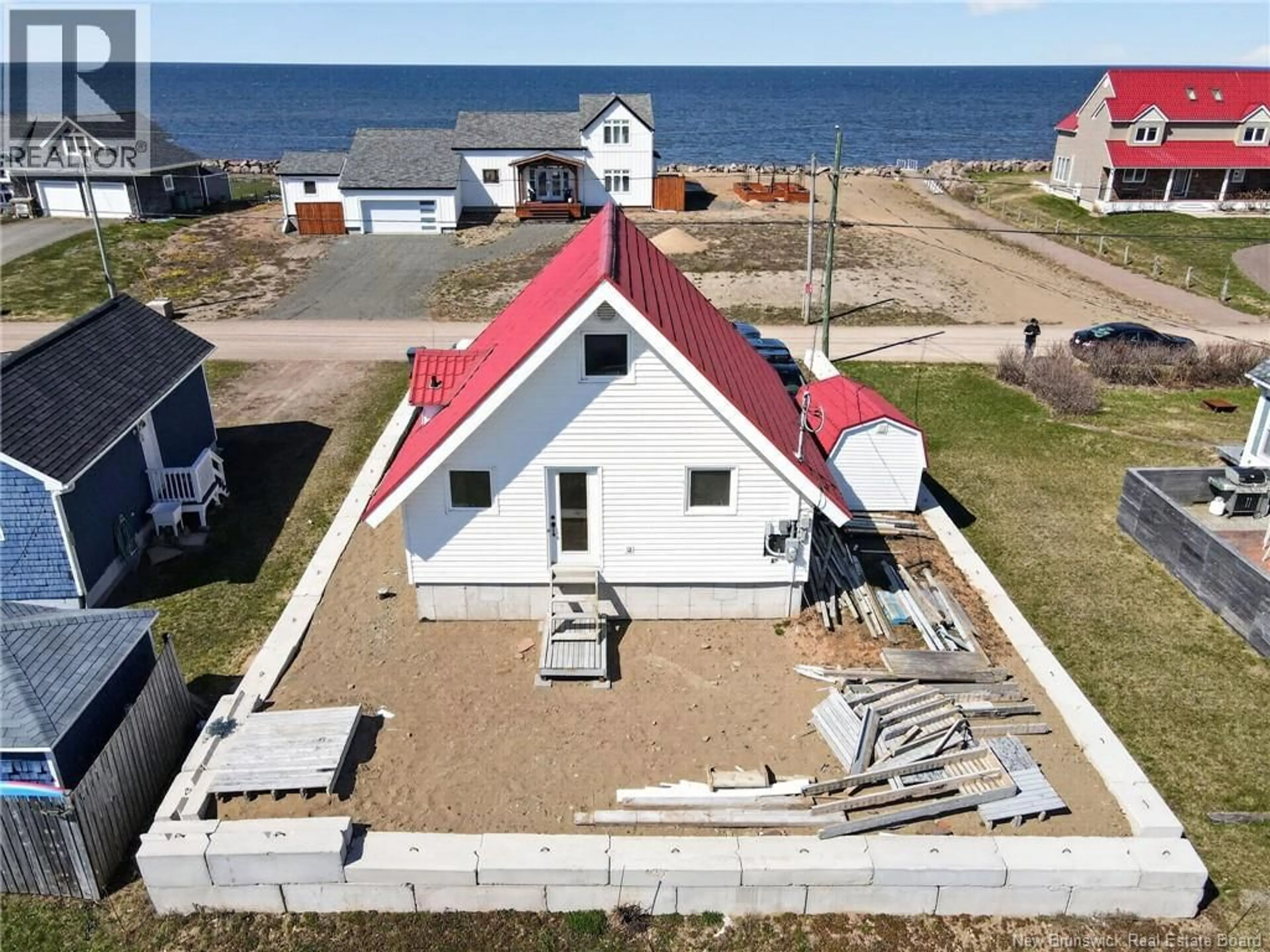 A pic from outside/outdoor area/front of a property/back of a property/a pic from drone, building for 11 SUR L' OCEAN STREET, Grand-Barachois New Brunswick E4P8N9