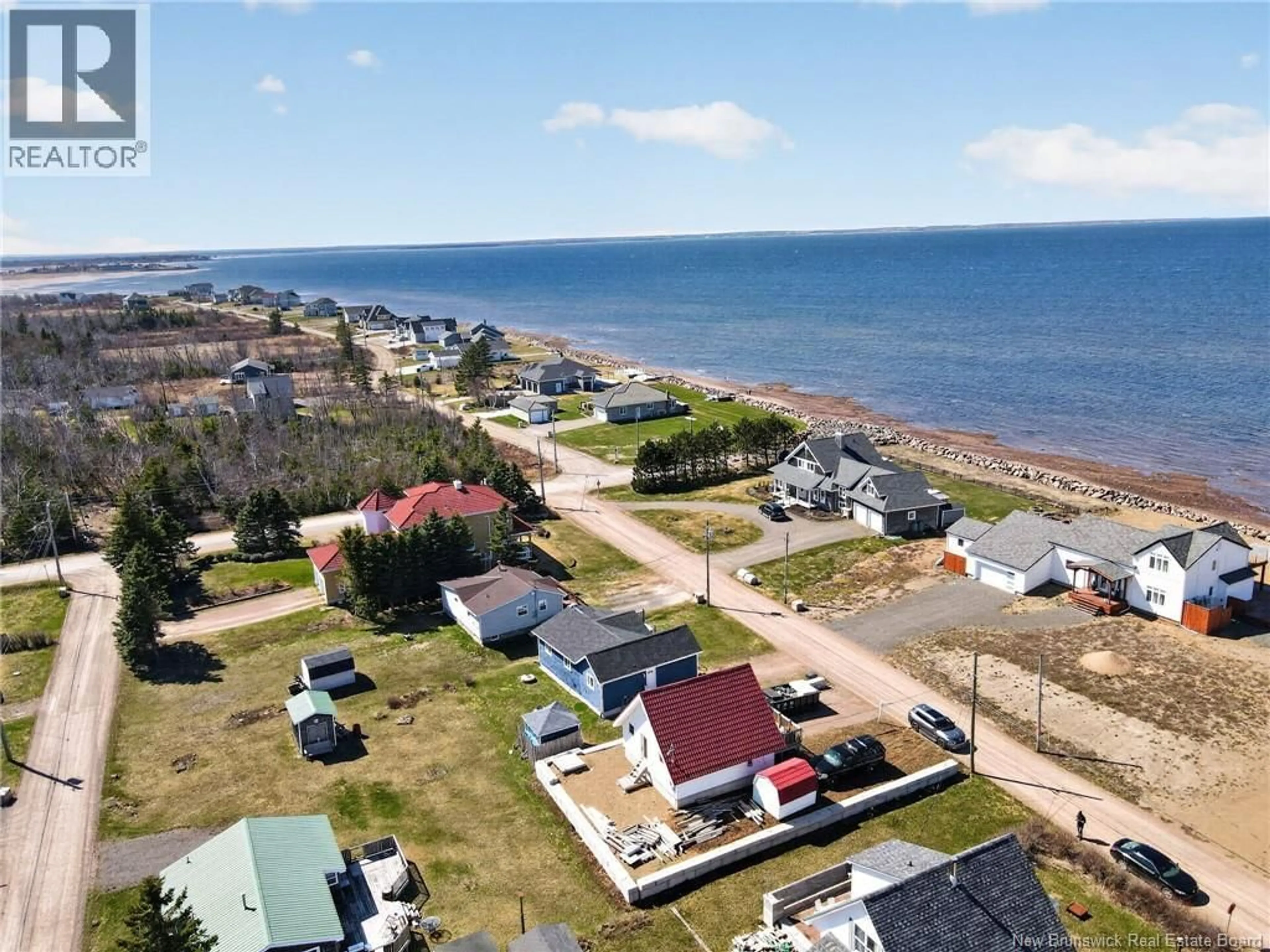 A pic from outside/outdoor area/front of a property/back of a property/a pic from drone, water/lake/river/ocean view for 11 SUR L' OCEAN STREET, Grand-Barachois New Brunswick E4P8N9