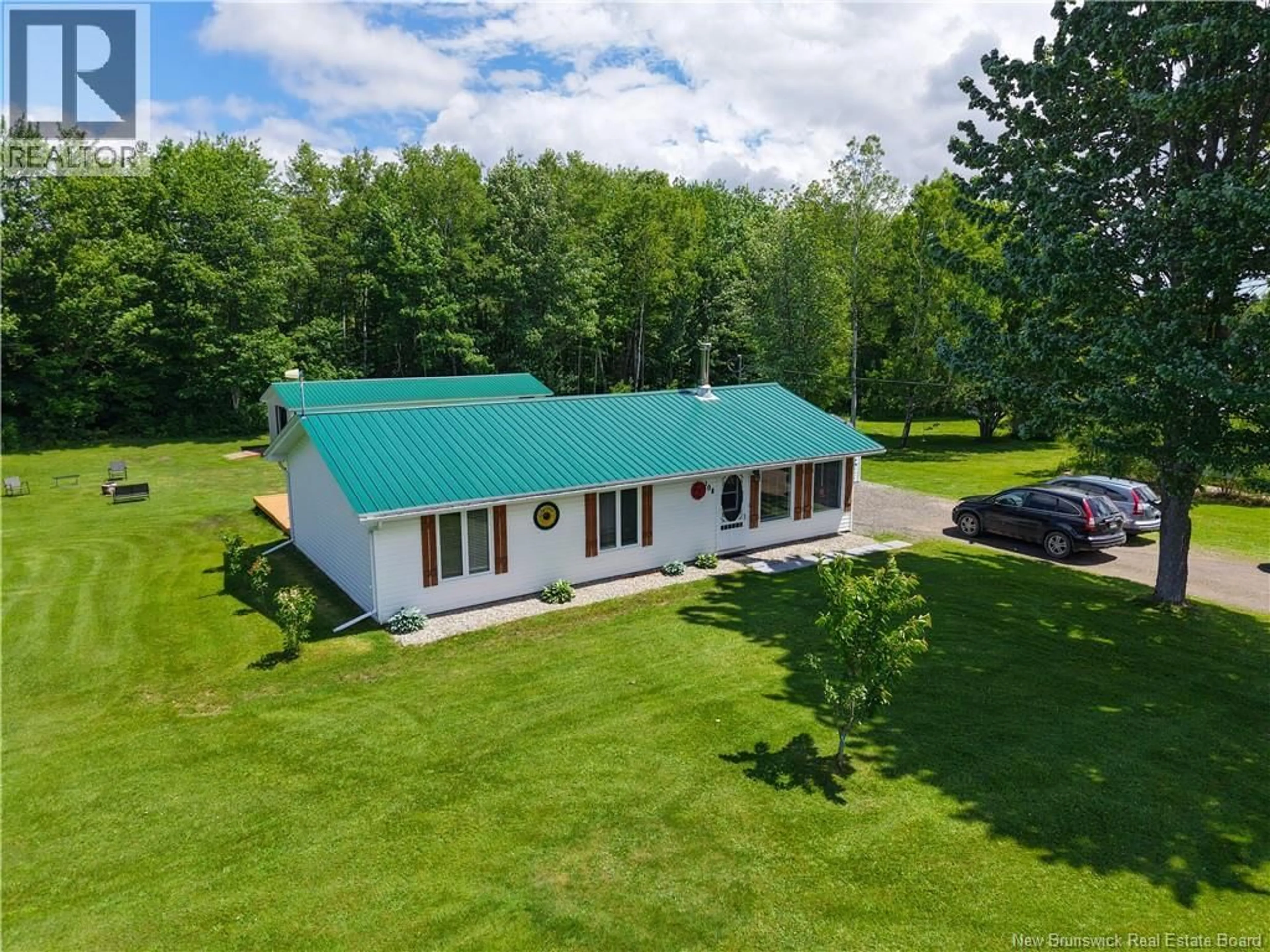 A pic from outside/outdoor area/front of a property/back of a property/a pic from drone, water/lake/river/ocean view for 108 LEWIS ROAD, Colpitts Settlement New Brunswick E4J1G5