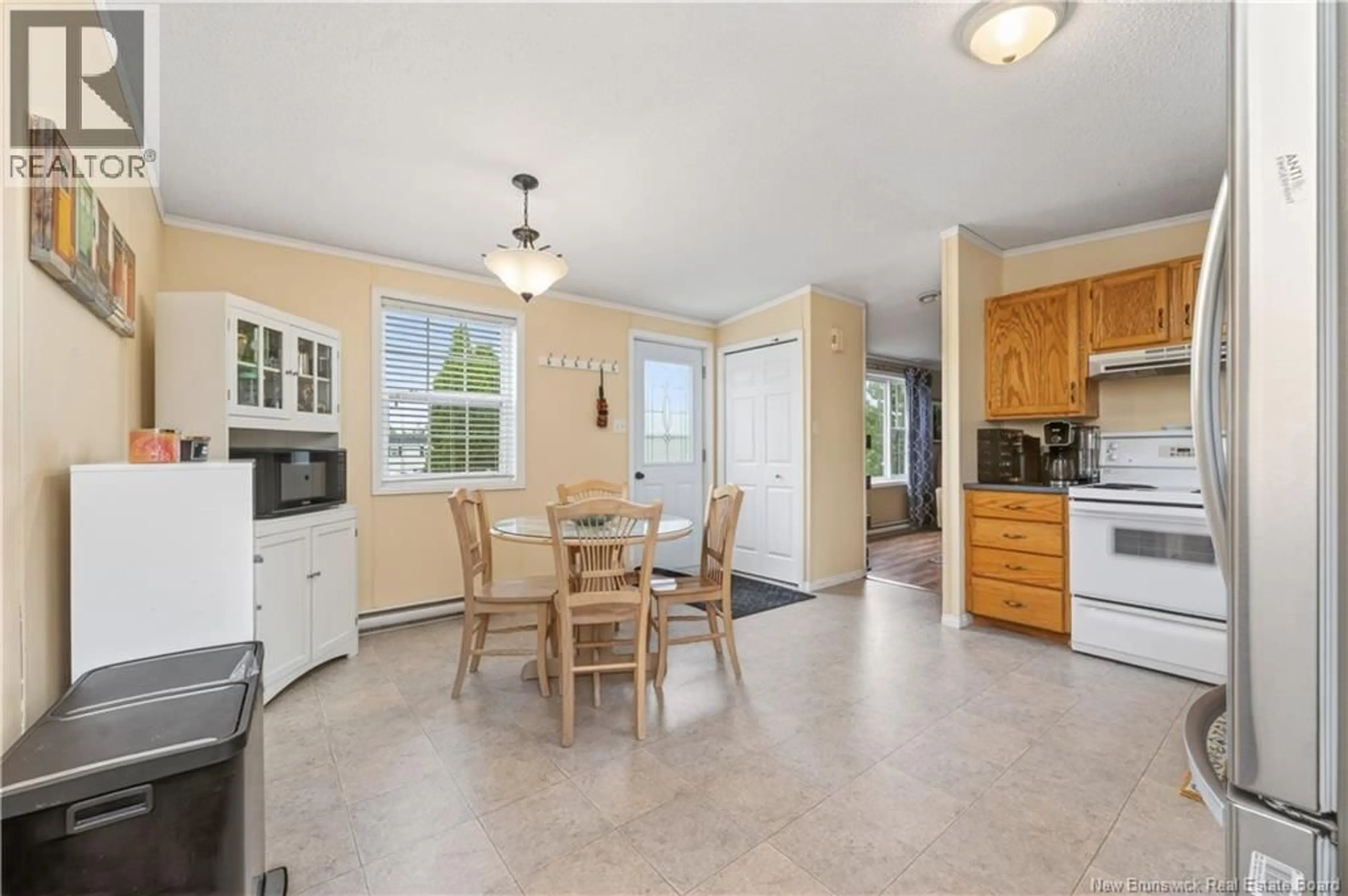 Open concept kitchen, ceramic/tile floor for 3 DARTMOUTH COURT, Riverview New Brunswick E1B5R3