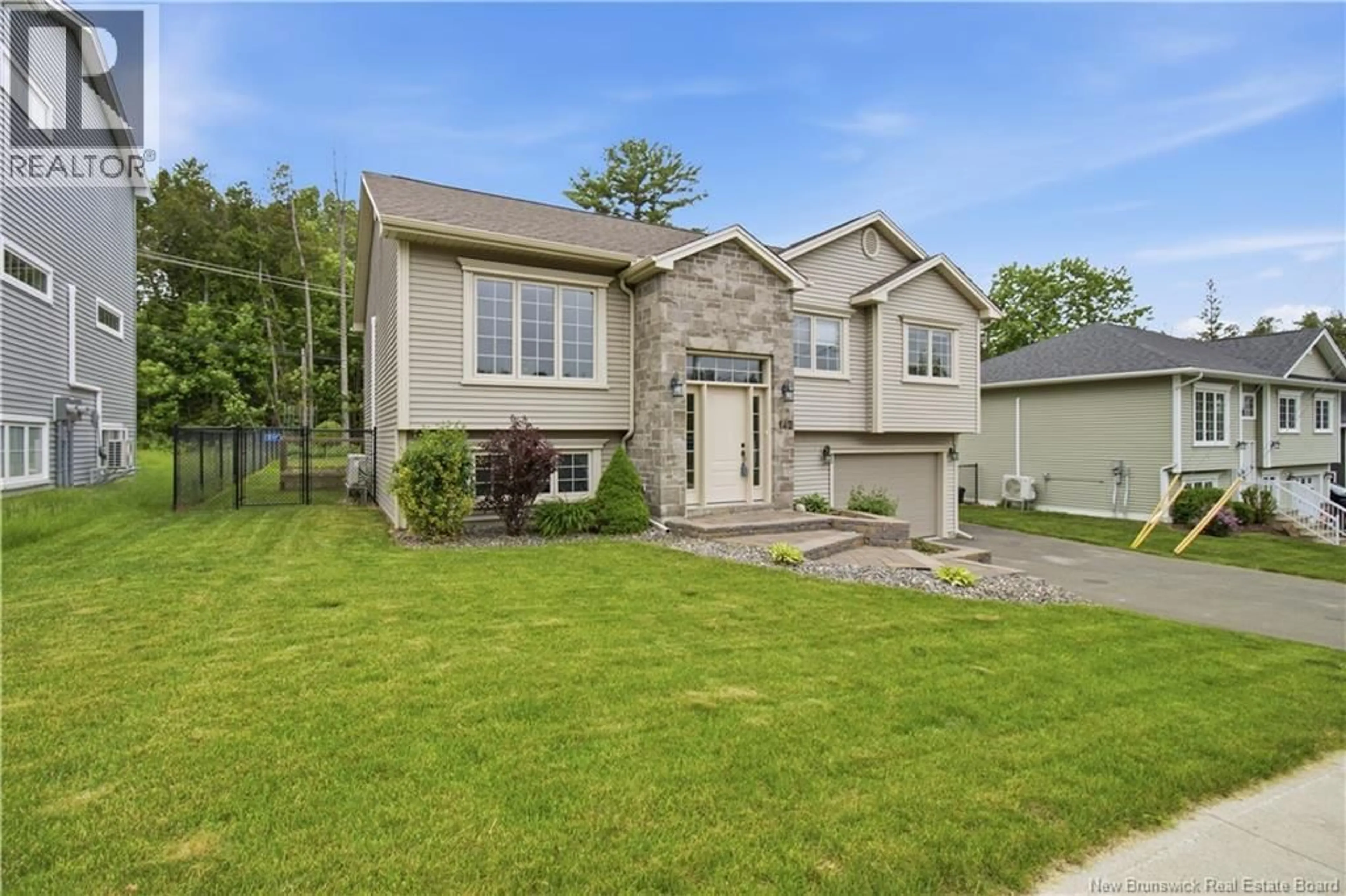 Home with vinyl exterior material, street for 142 MOOERS DRIVE, Fredericton New Brunswick E3C0J6